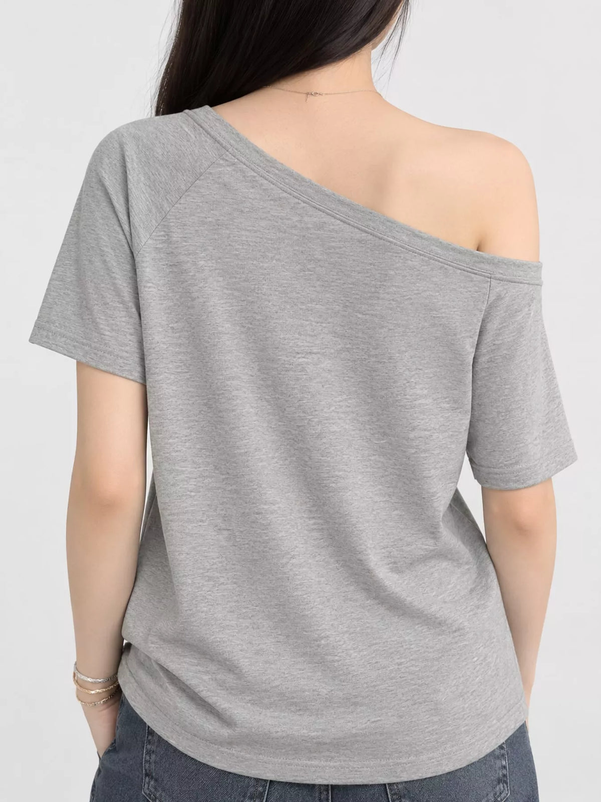 Gray asymmetric-neck T-shirt, back view