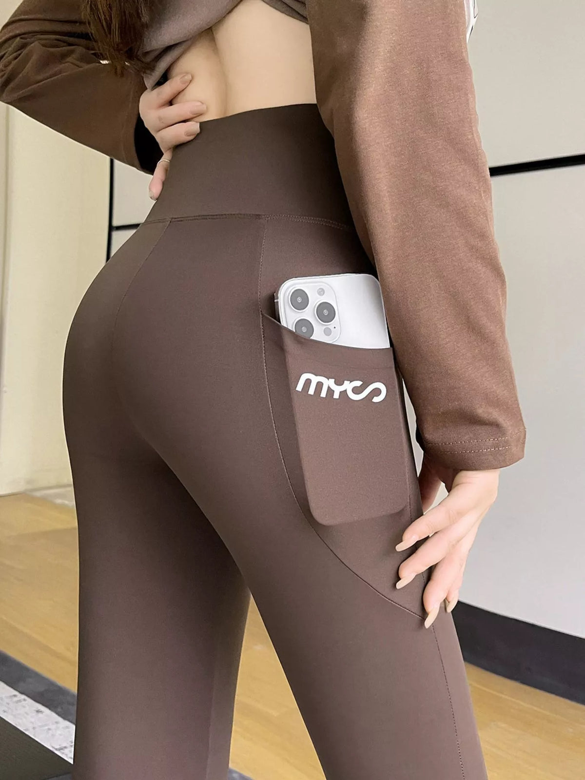 Women's High-Waisted Active Leggings with Side Pockets in brown — side view