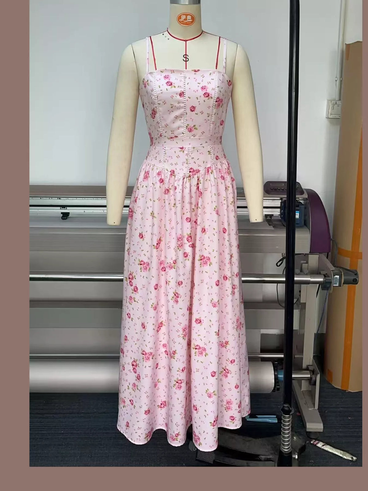 Women's Paneled Bodice Gathered Midi Dress in pink floral — mannequin front view