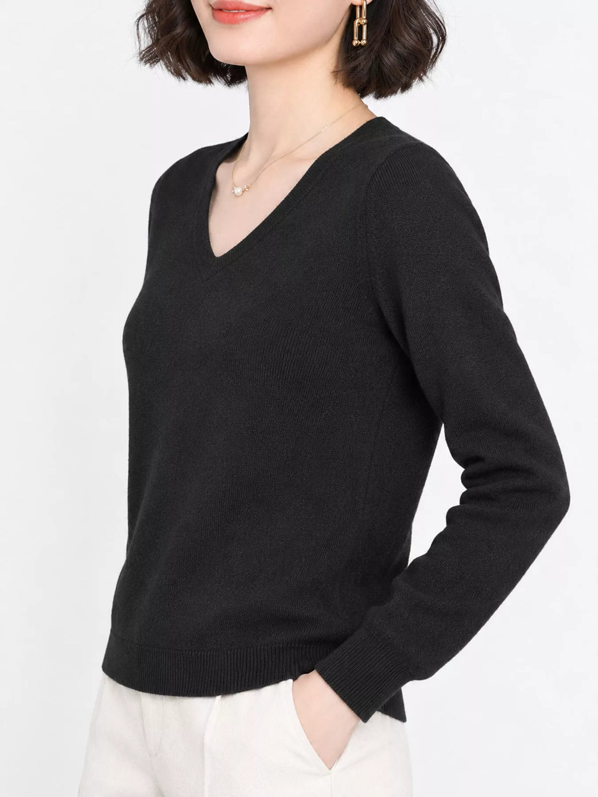 Black v-neck long sleeve knit top