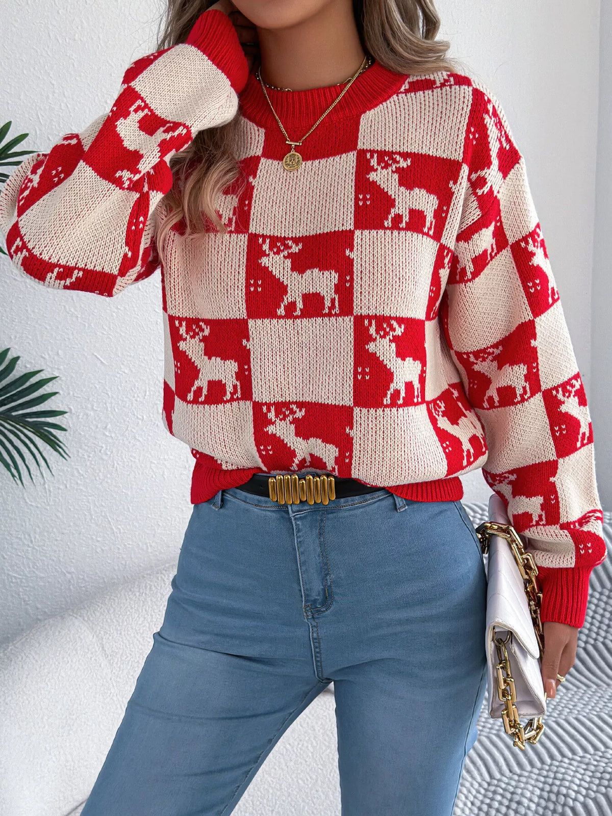 Reindeer Checkerboard Pattern Pullover Sweater in red and cream, front view