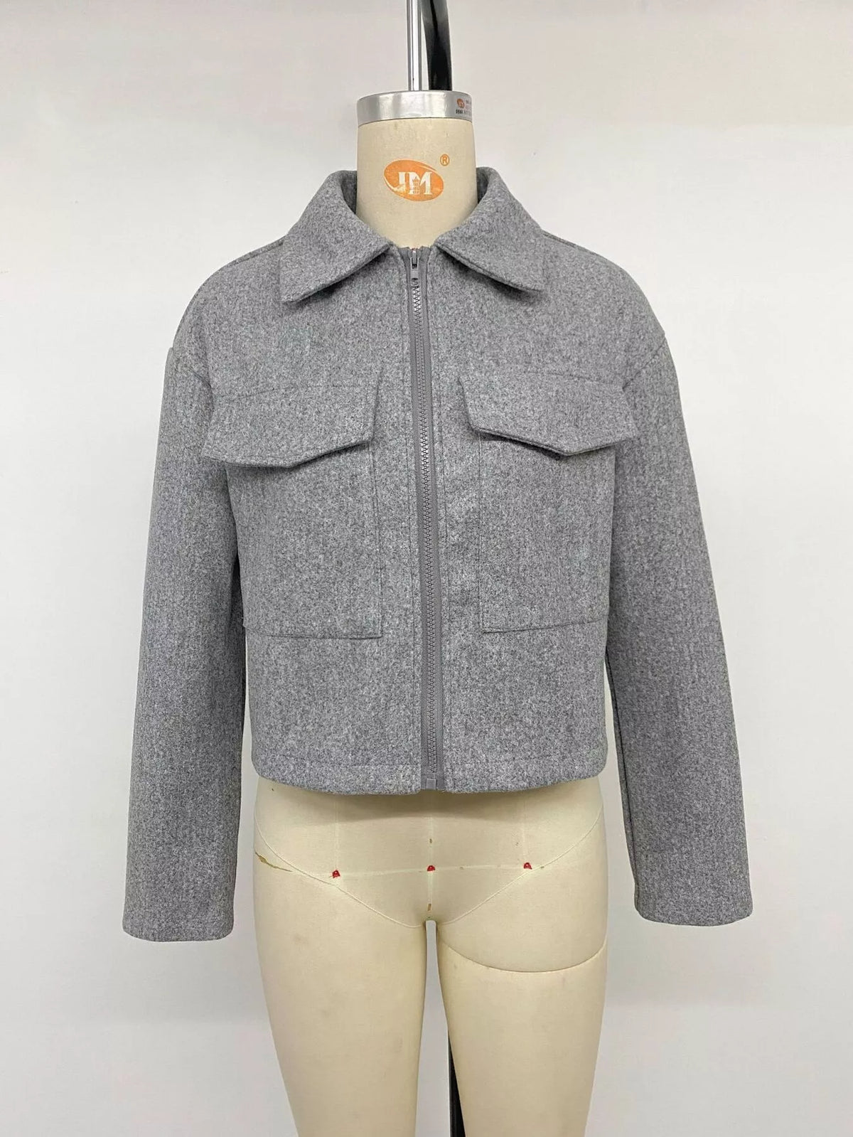 Gray zip-up cropped shacket, closed front on mannequin