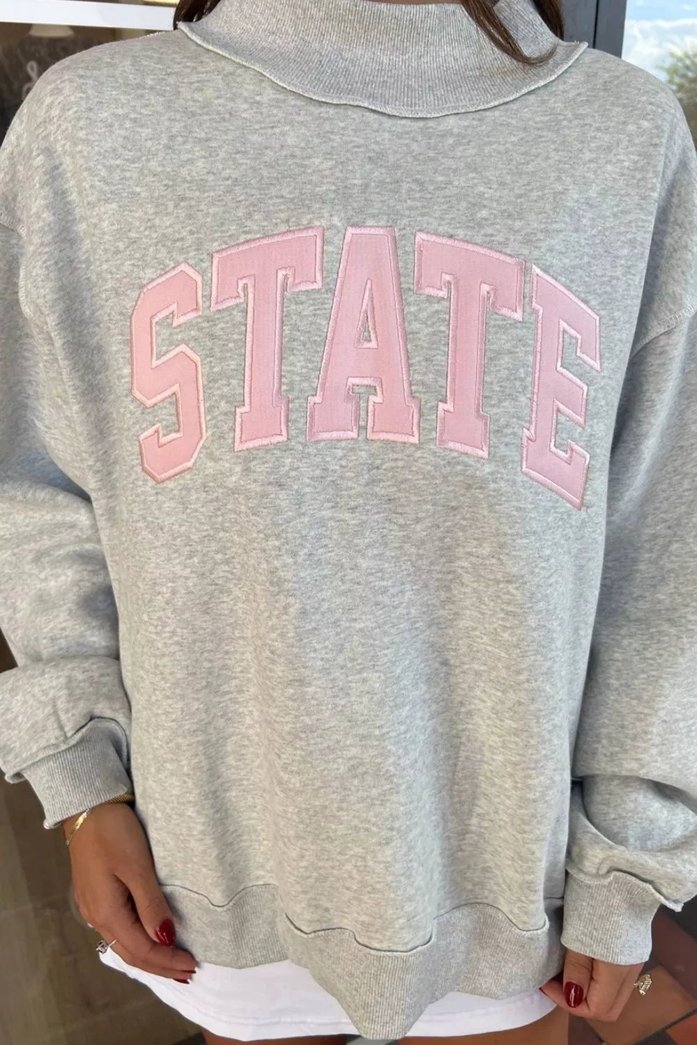 STATE Graphic Exposed Seam Mock Neck Sweatshirt in gray, lettering detail