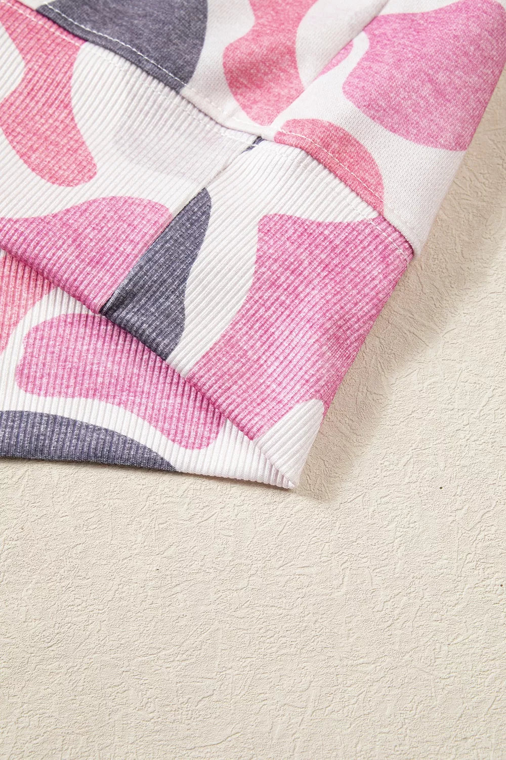 Pink camouflage Howdy sweatshirt, hem detail