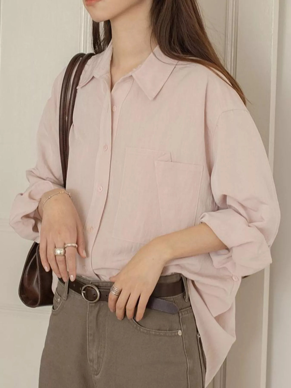 Pink button down long sleeve shirt, front view
