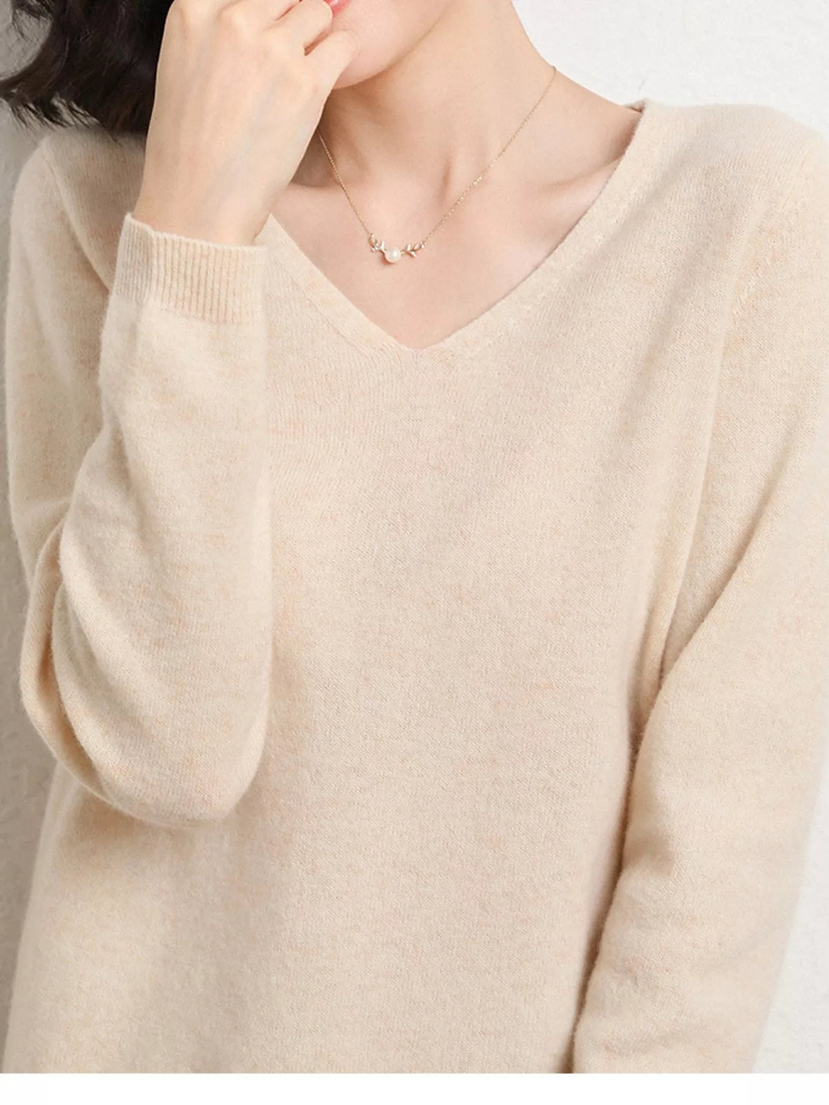 Beige v-neck long sleeve knit top