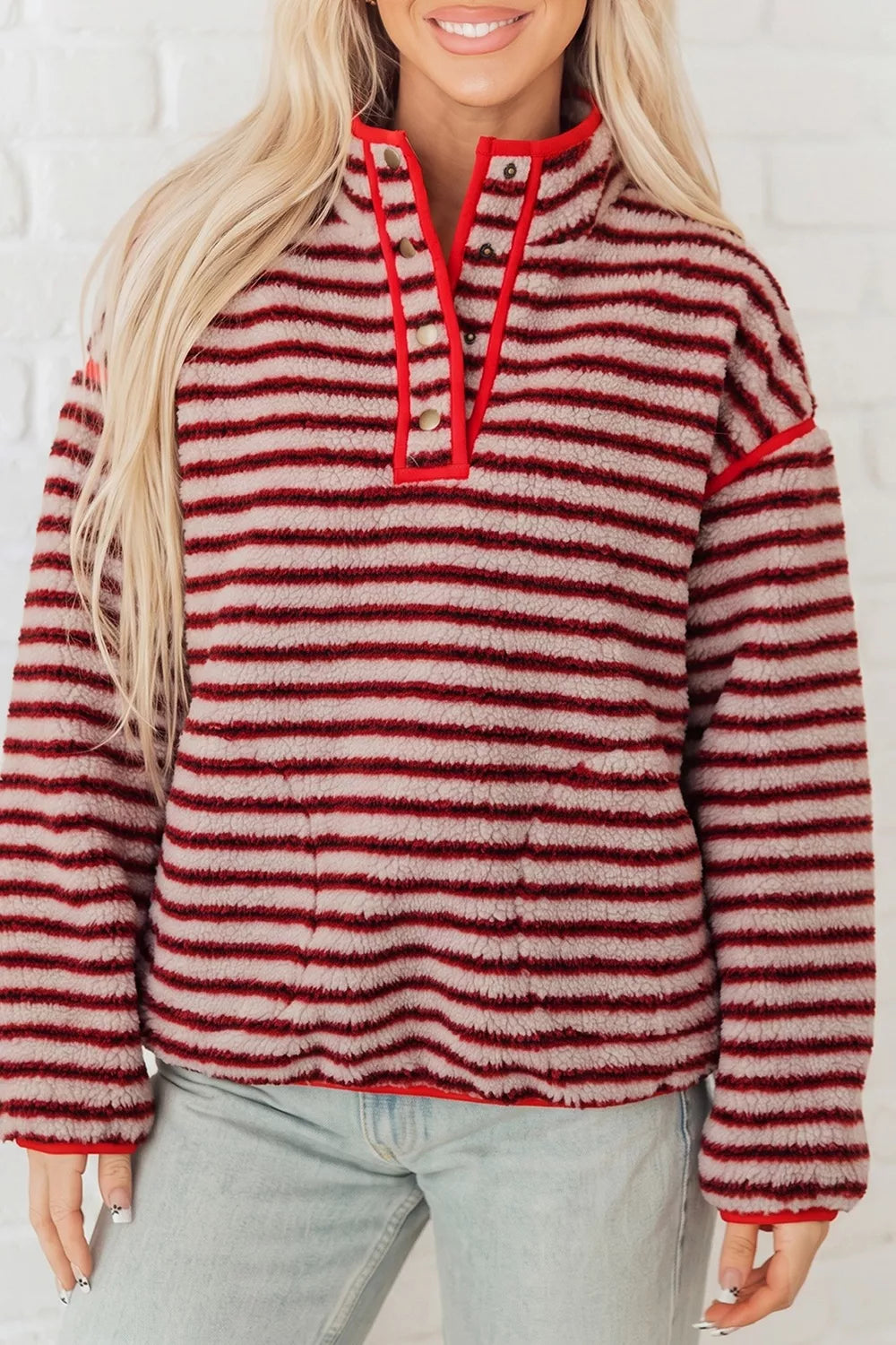 Red and cream striped fuzzy snap-placket sweatshirt, front view