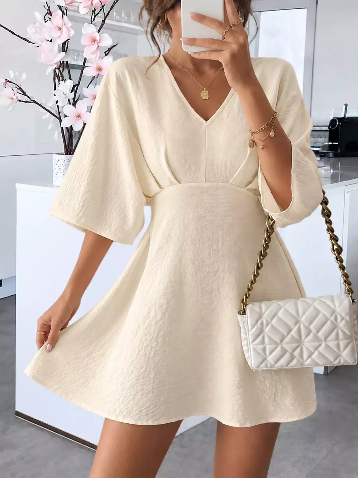 V-Neck Textured Mini Dress in beige
