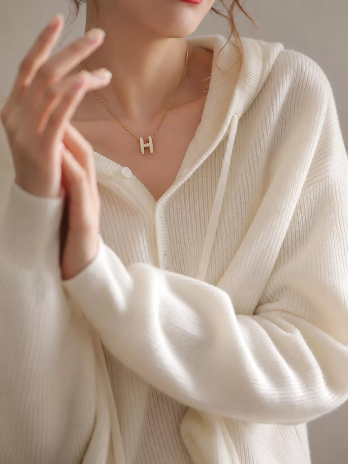 Hooded long sleeve sweater, construction and design details
