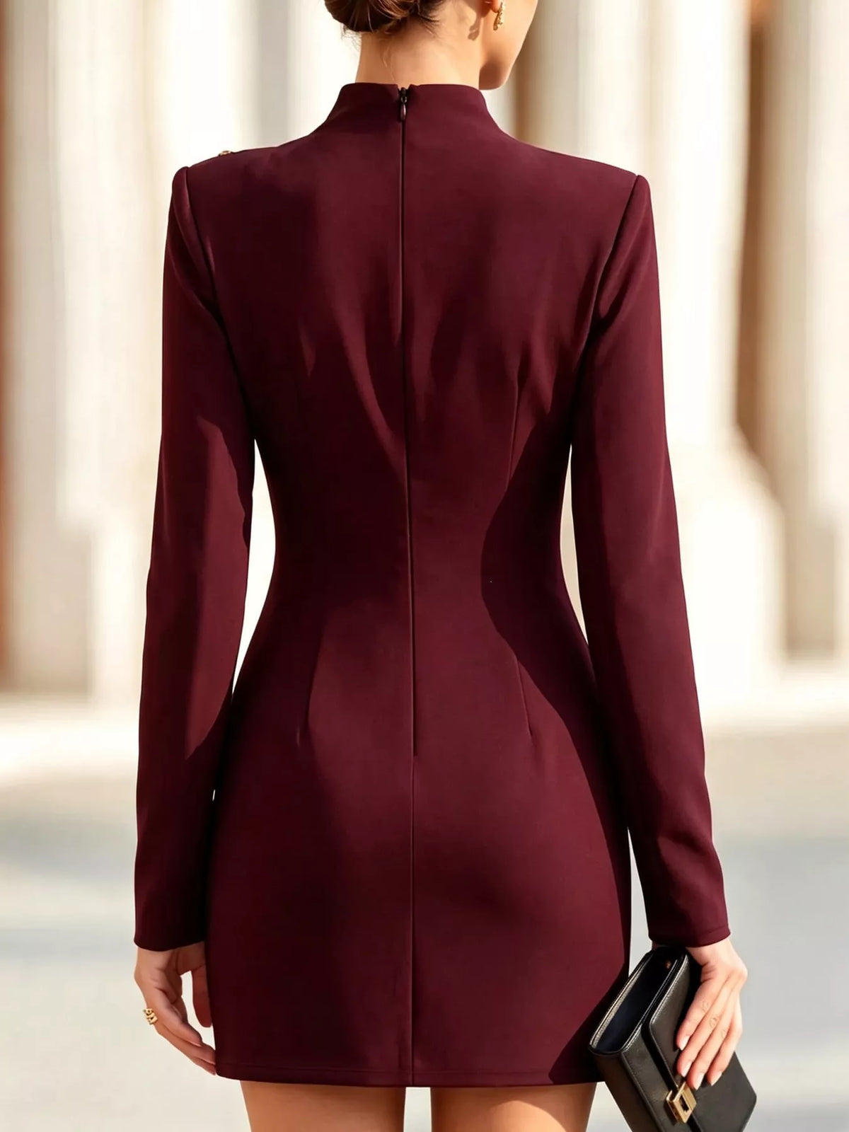 Burgundy decorative button mock neck mini dress, back view