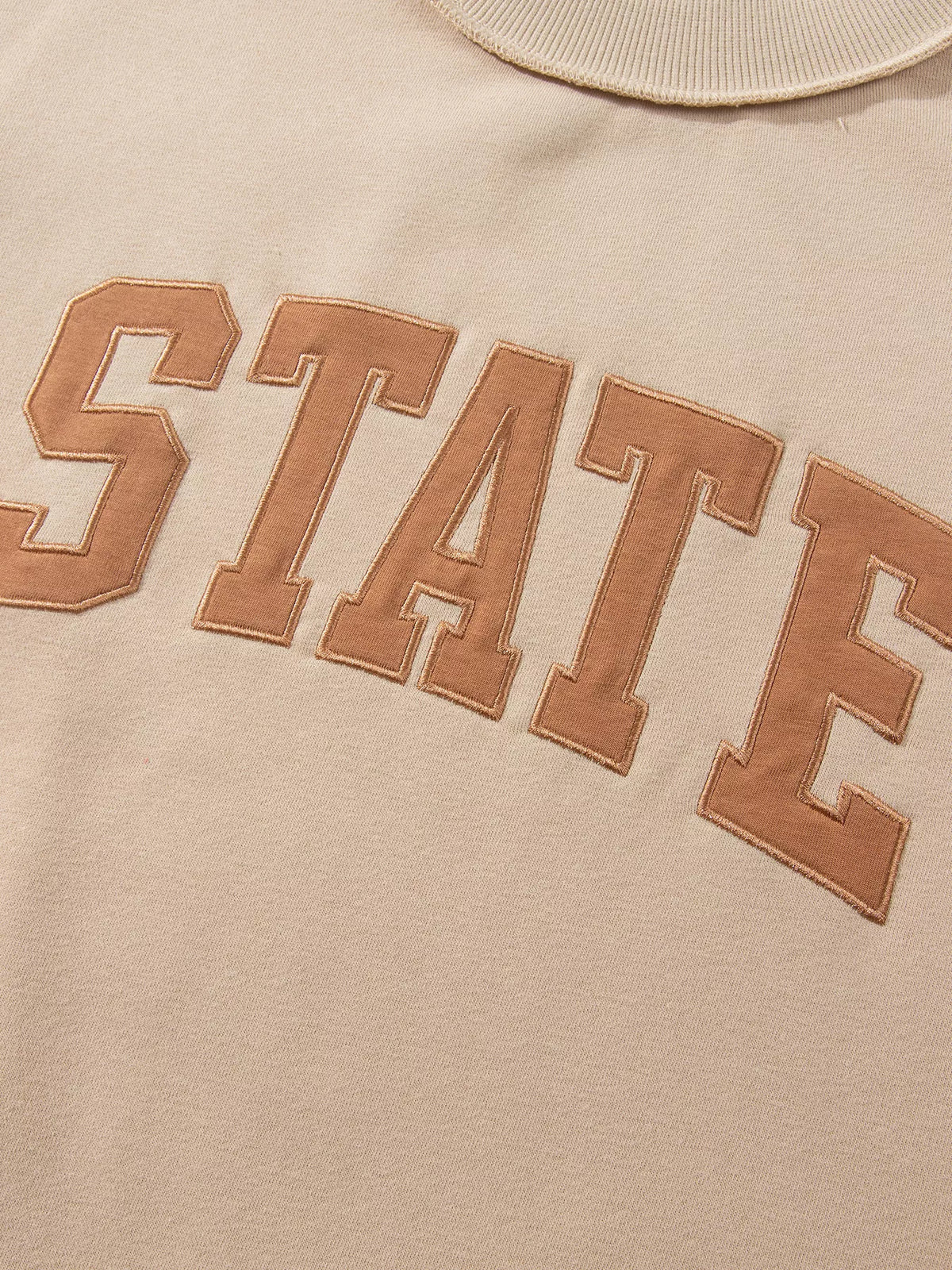 STATE Graphic Exposed Seam Mock Neck Sweatshirt — construction details
