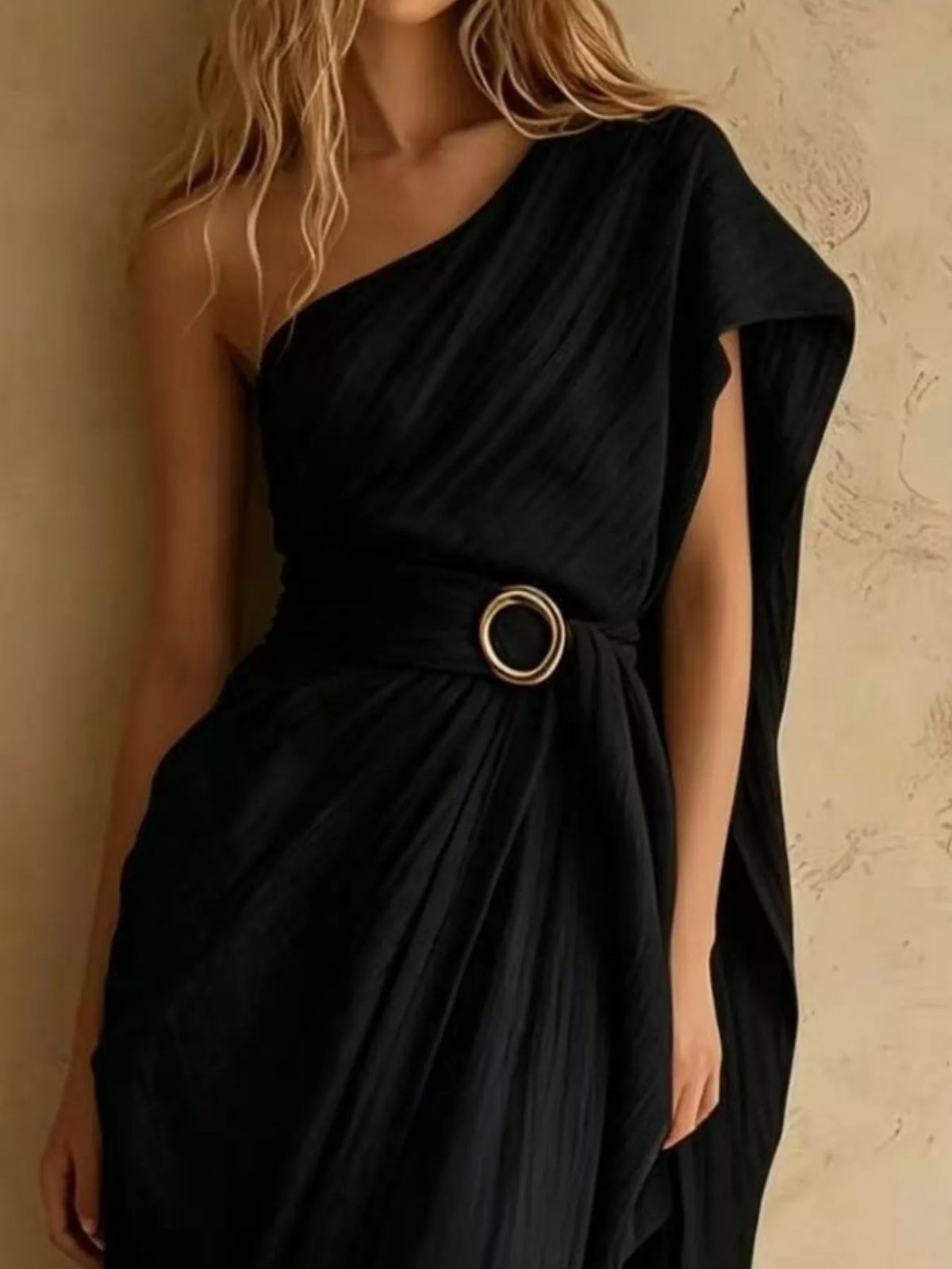 Black one-shoulder draped maxi dress, draped neckline and buckle detail