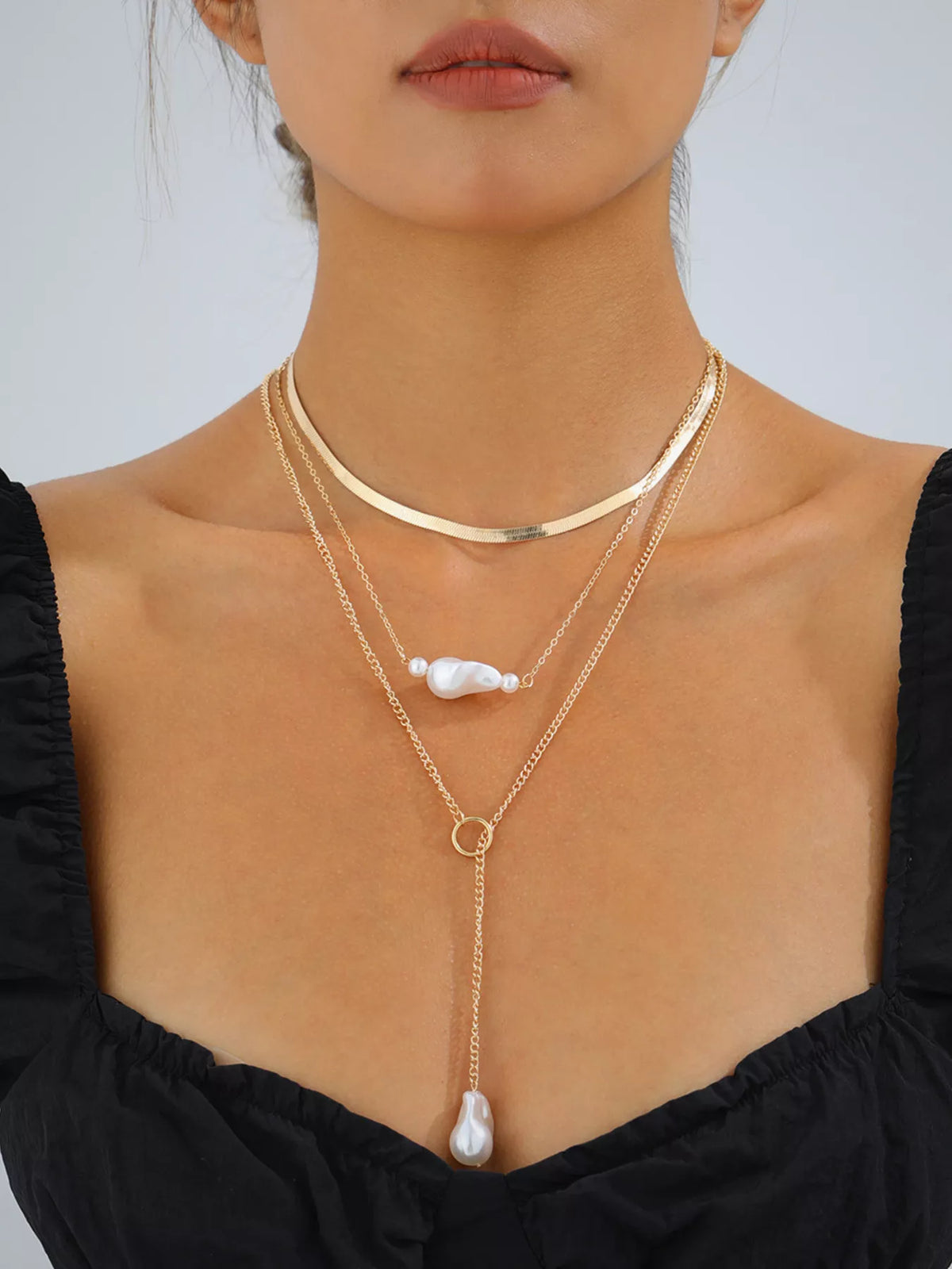 Gold three-layer pearl necklace