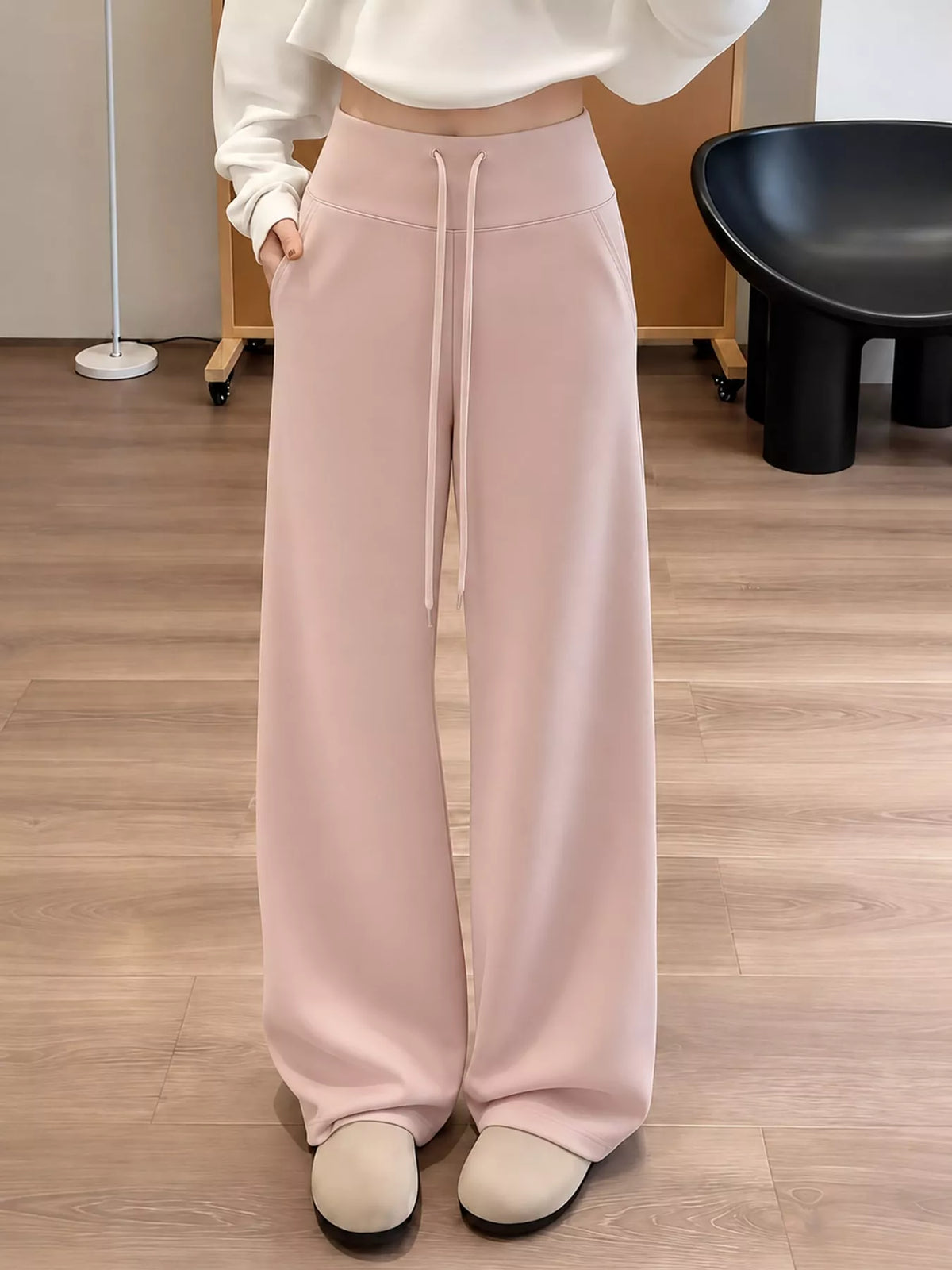 Pink drawstring wide-leg pants — front view