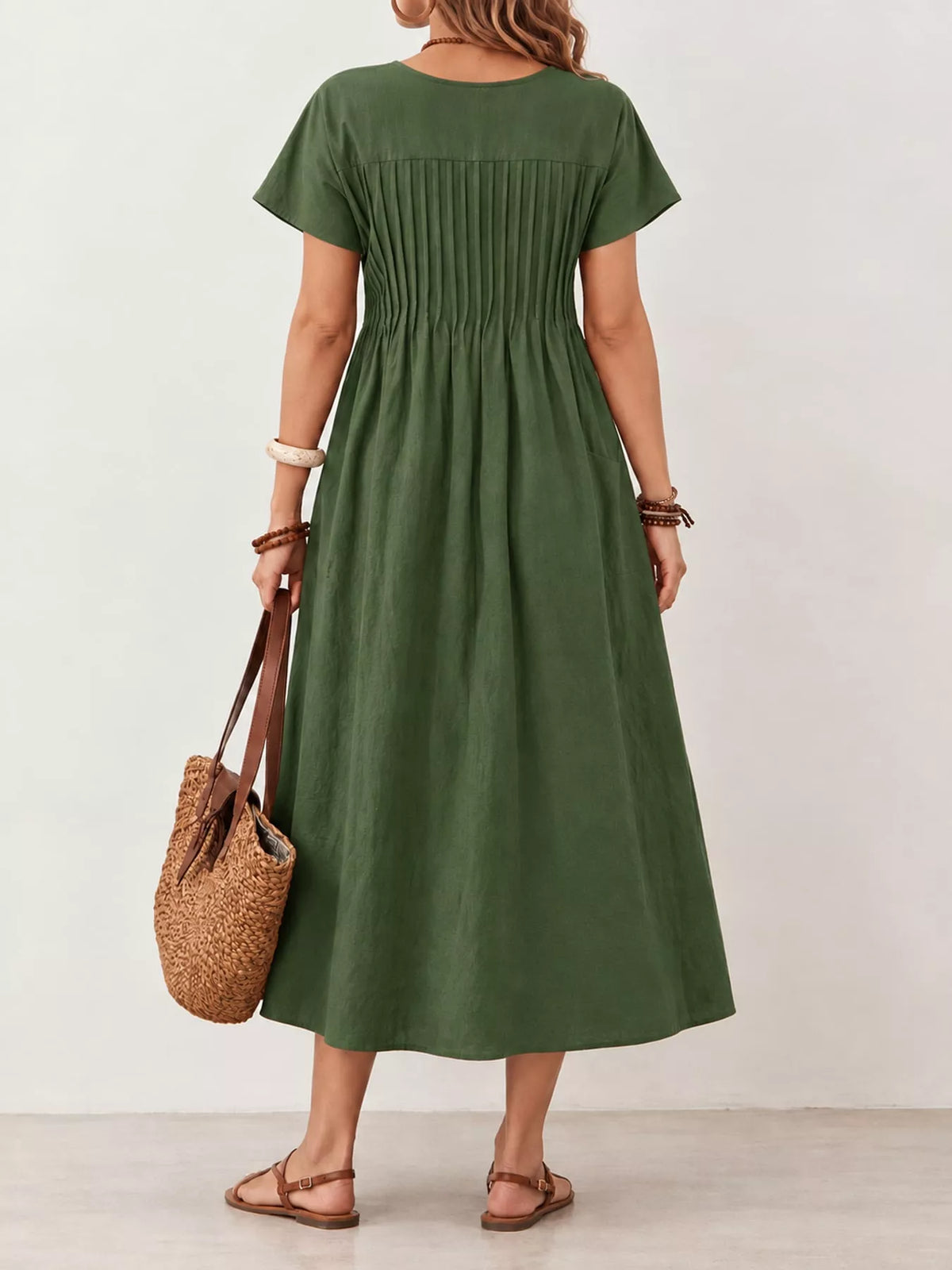 Pleated Midi Dress with Pockets, back view in olive green