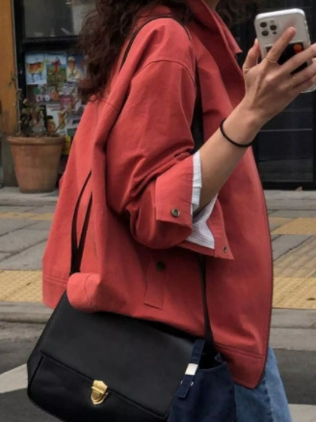 Red zip-up dropped shoulder jacket, side view