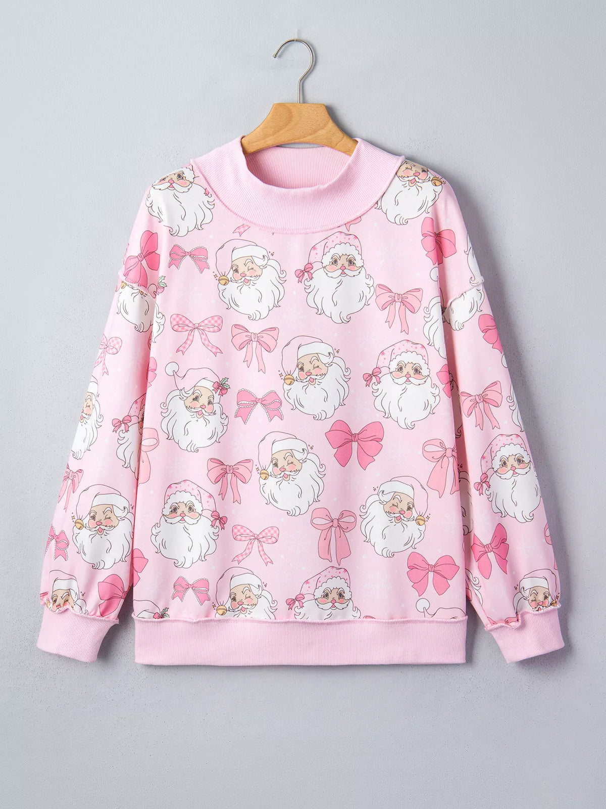 Santa-and-bow sweatshirt, pink hanging front