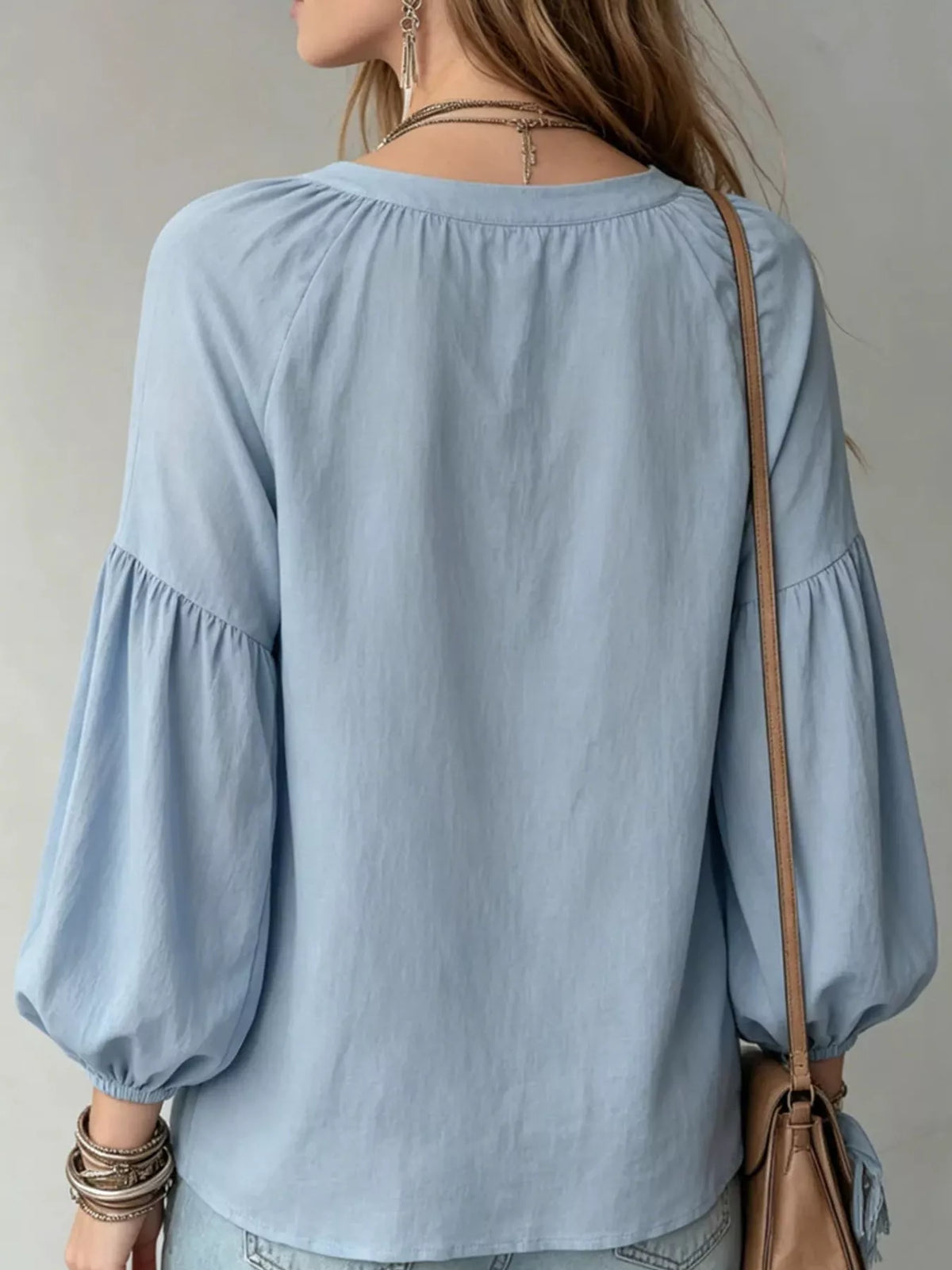 Notched Balloon Sleeve Blouse in light blue, back view