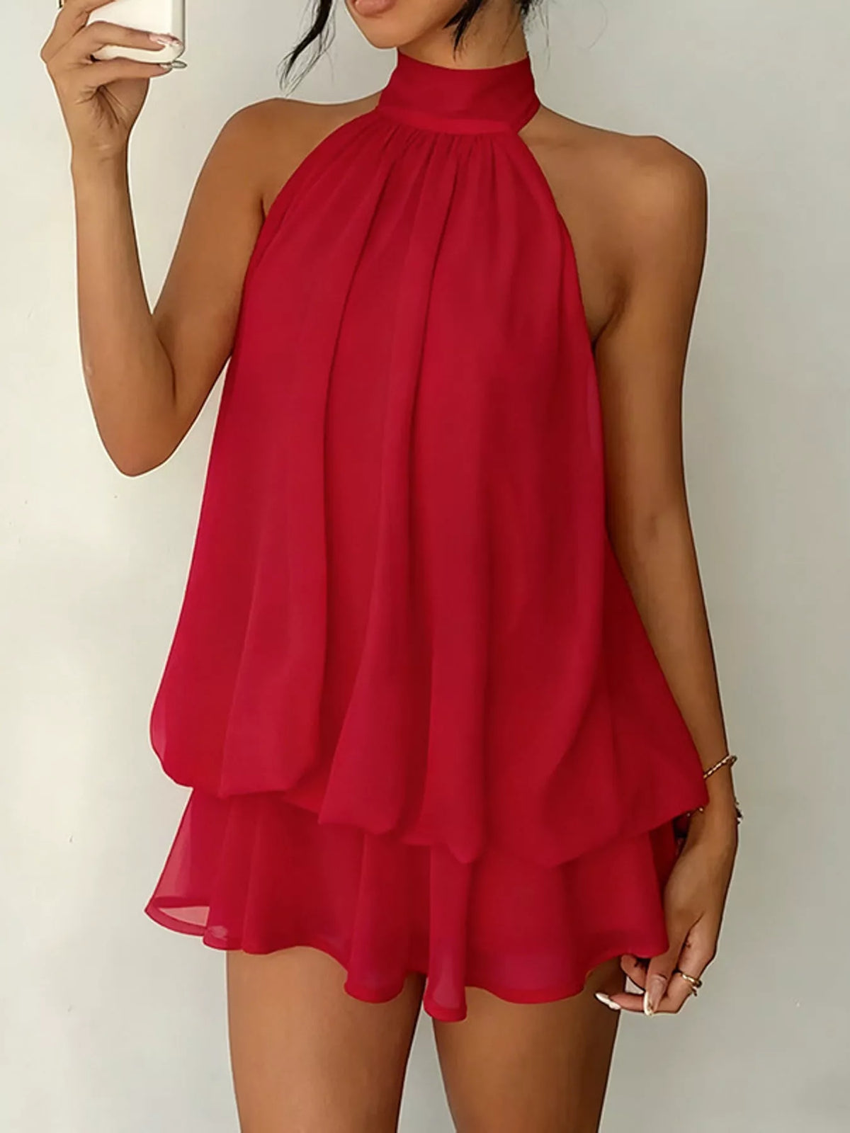 Red halter neck layered mini dress, halter neckline view
