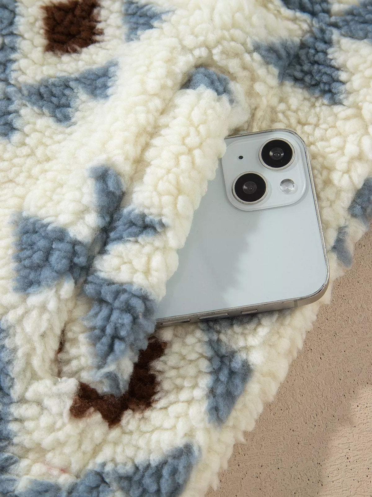 Cream blue and brown geometric print sherpa sweatshirt, pocket detail