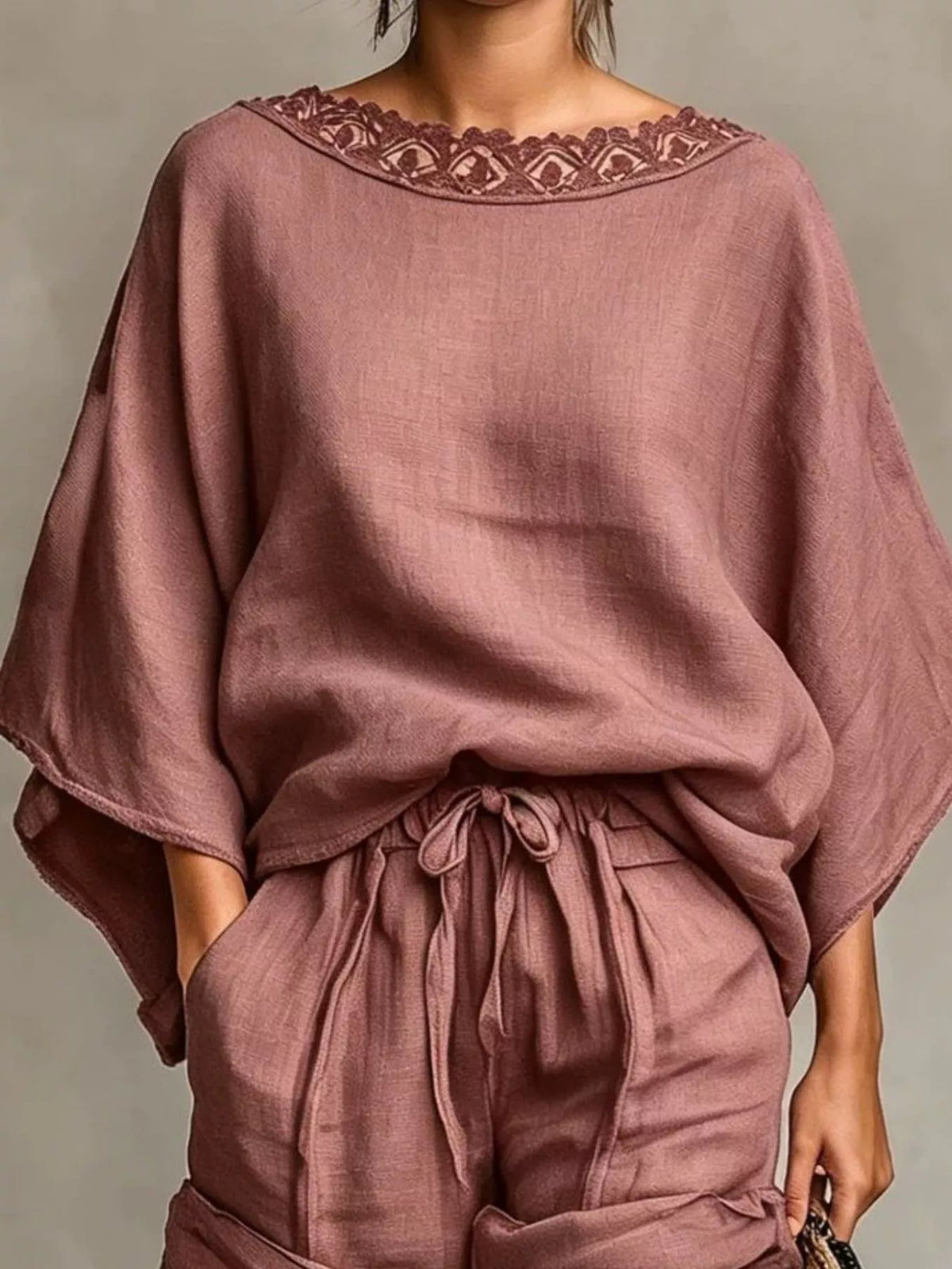 Dusty pink lace-trim top and drawstring shorts set, lace neckline and waist detail.