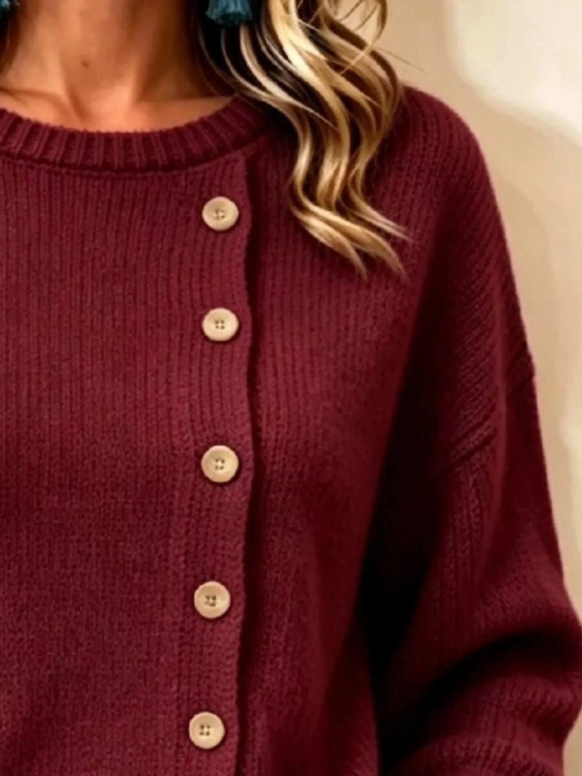 Women's Decorative Button Round Neck Sweater in burgundy — button detail view