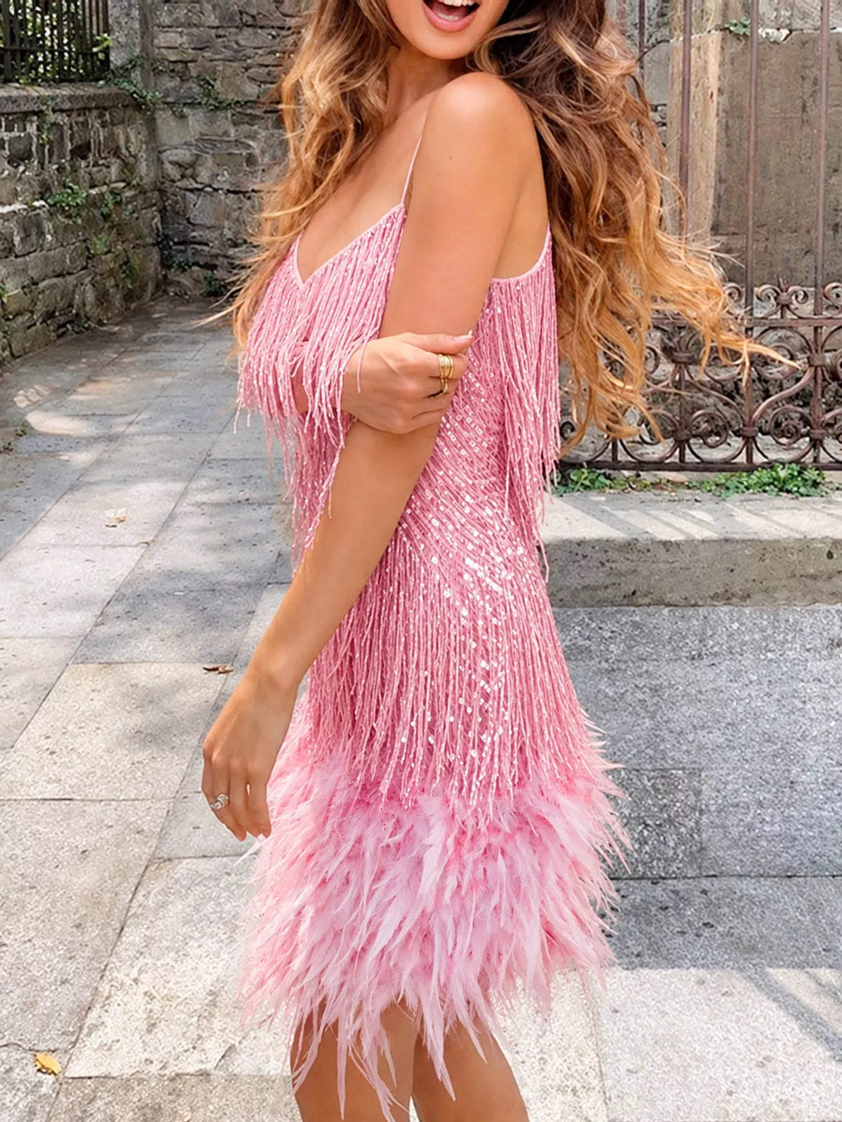 Pink feather fringe sequin mini dress, side view