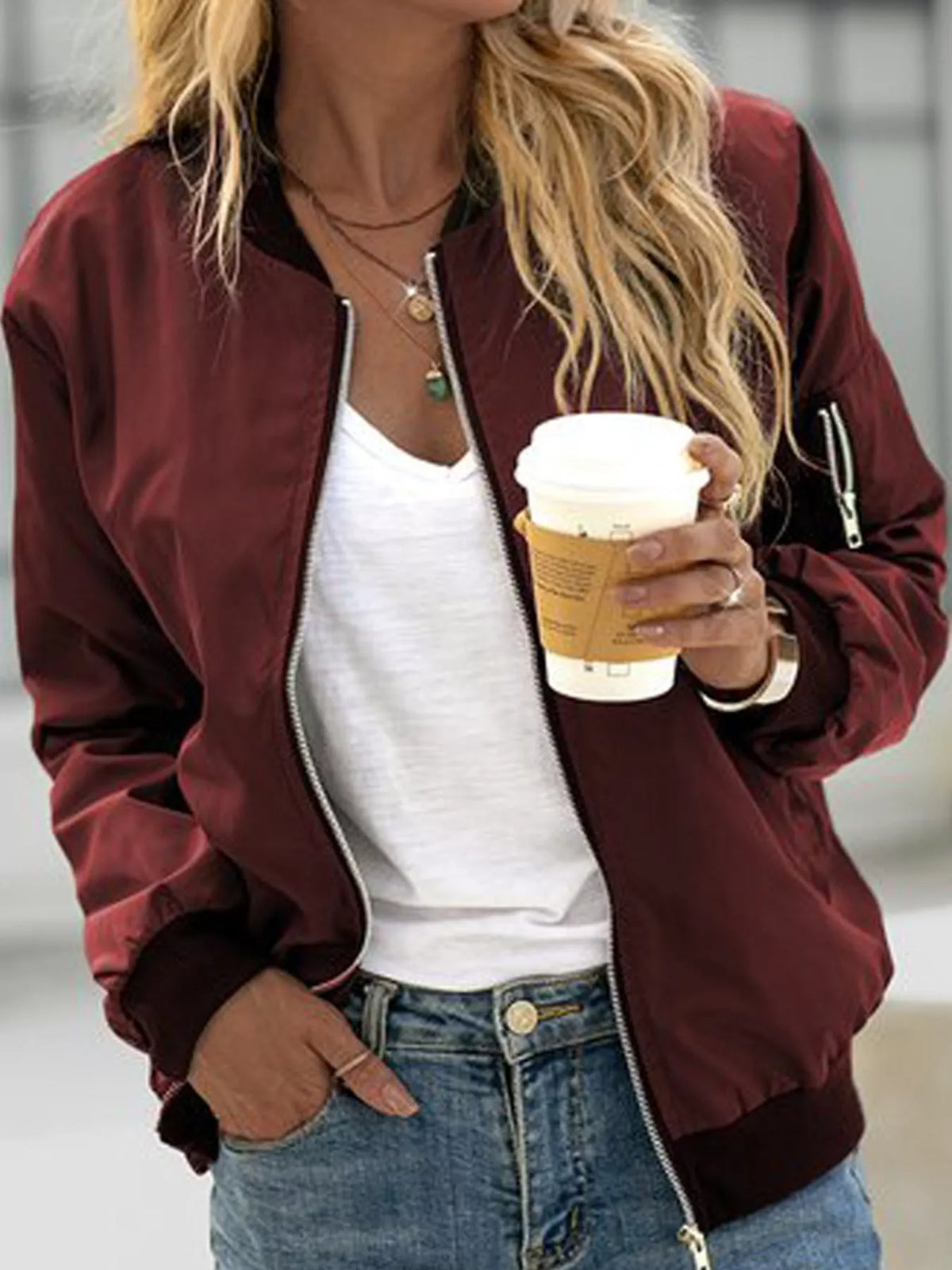 Burgundy zip-up bomber jacket — front view