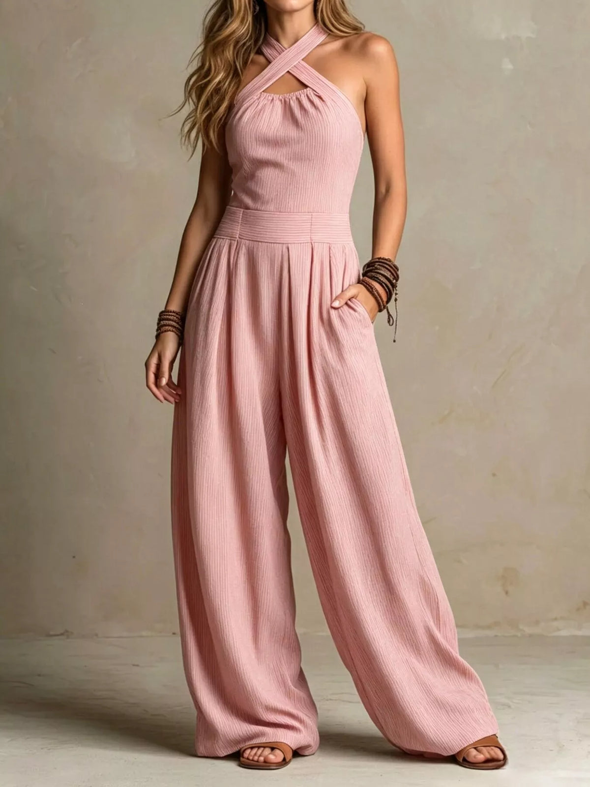 Pink halter-neck wide-leg jumpsuit, front view