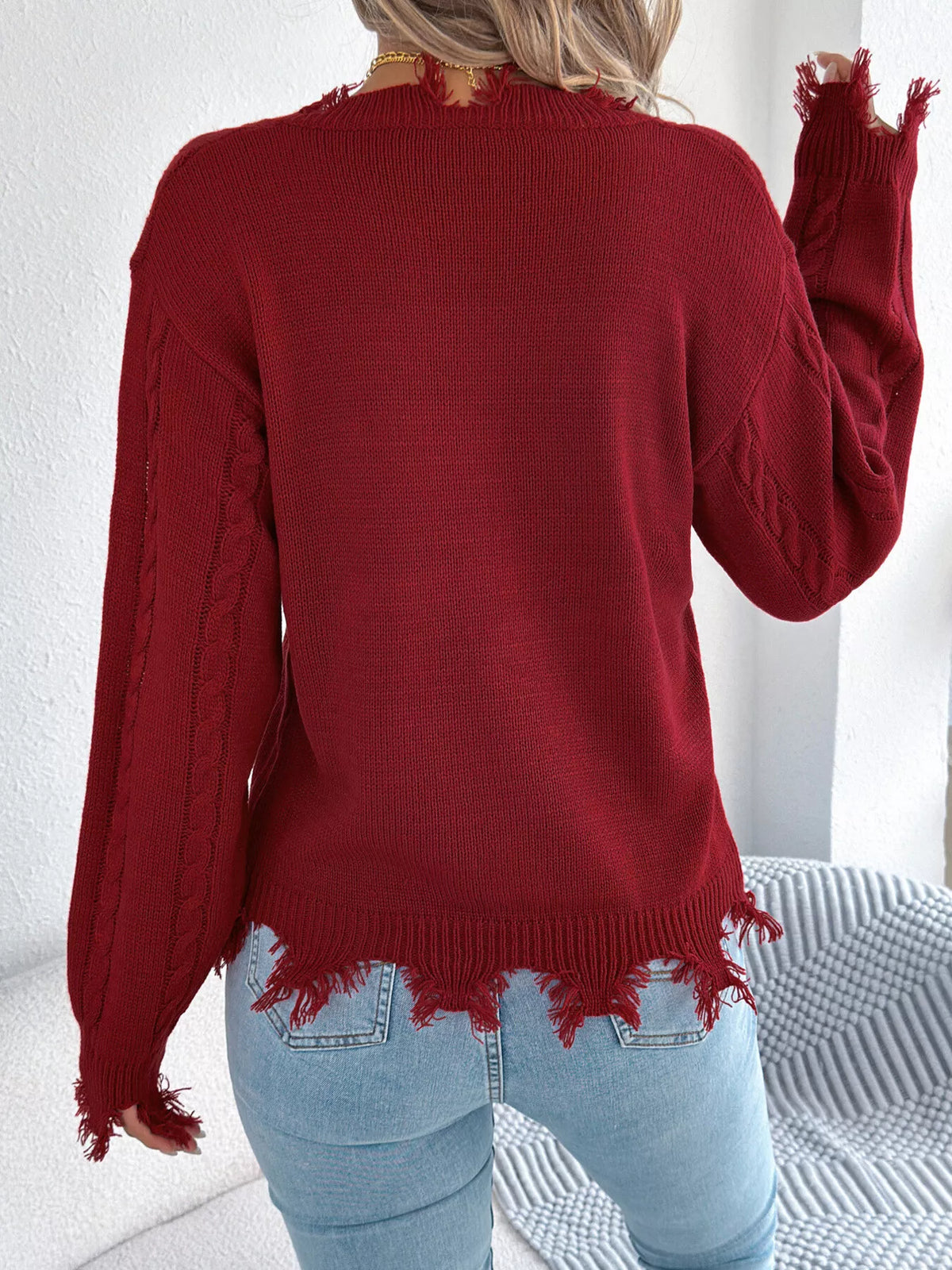 V-Neck Distressed Hem Cable Knit Sweater in burgundy, back view