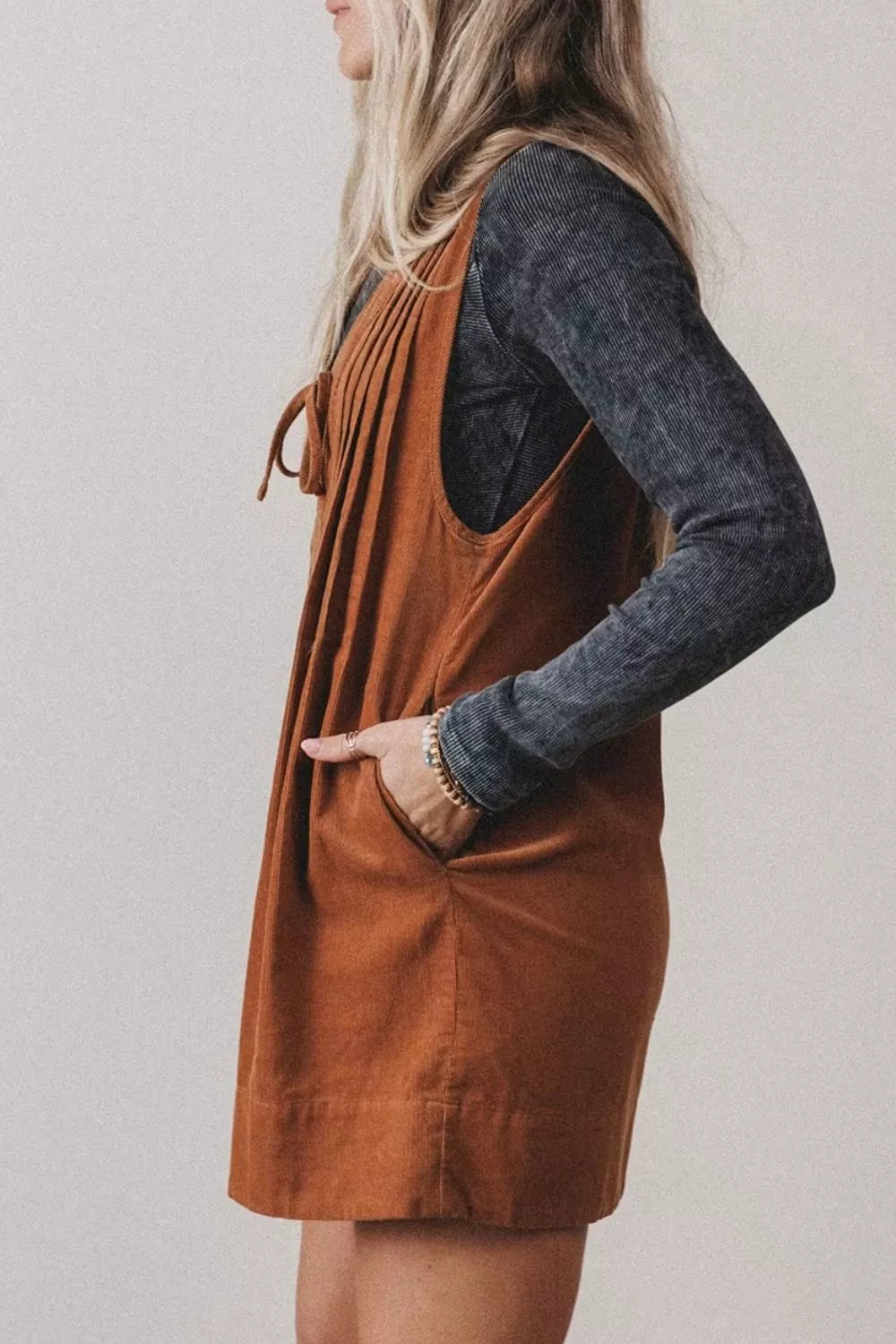 Rust brown corduroy romper, side pocket detail