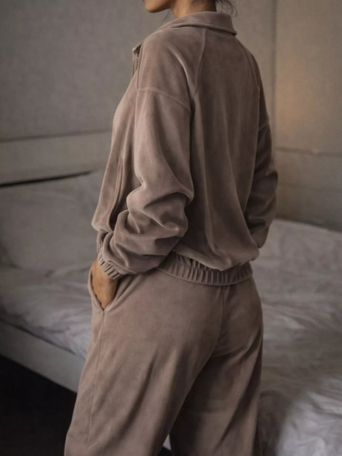 Brown zip-up outerwear and pants set — side view