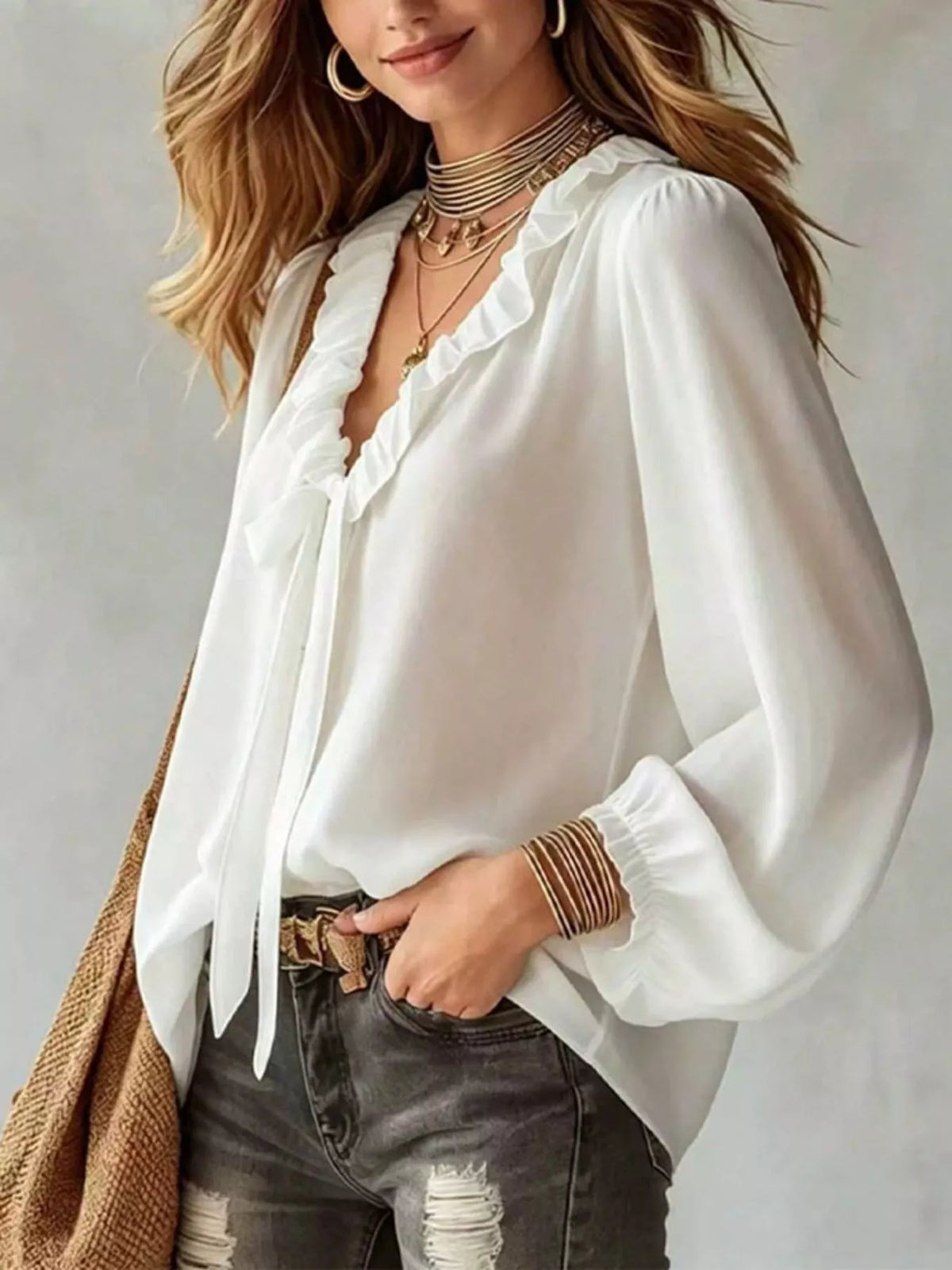 White ruffled v-neck blouse with tie-front detail