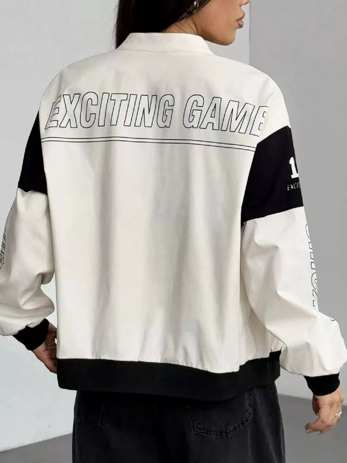White and black letter-print zip-front jacket, back view