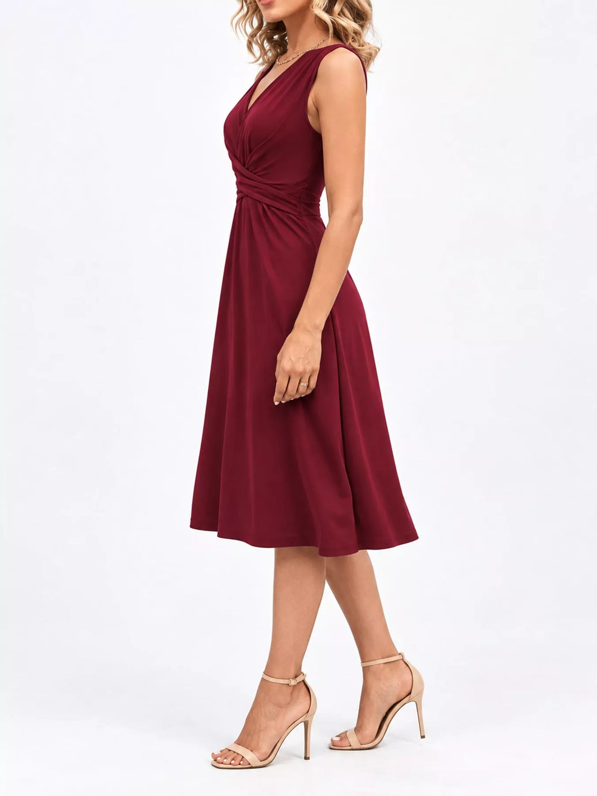 Burgundy sleeveless ruched-front midi dress, side view