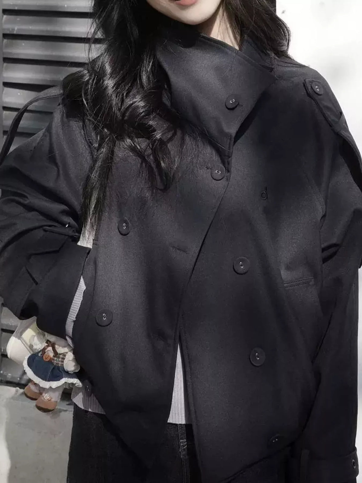 Black double-breasted cropped trench jacket, front view