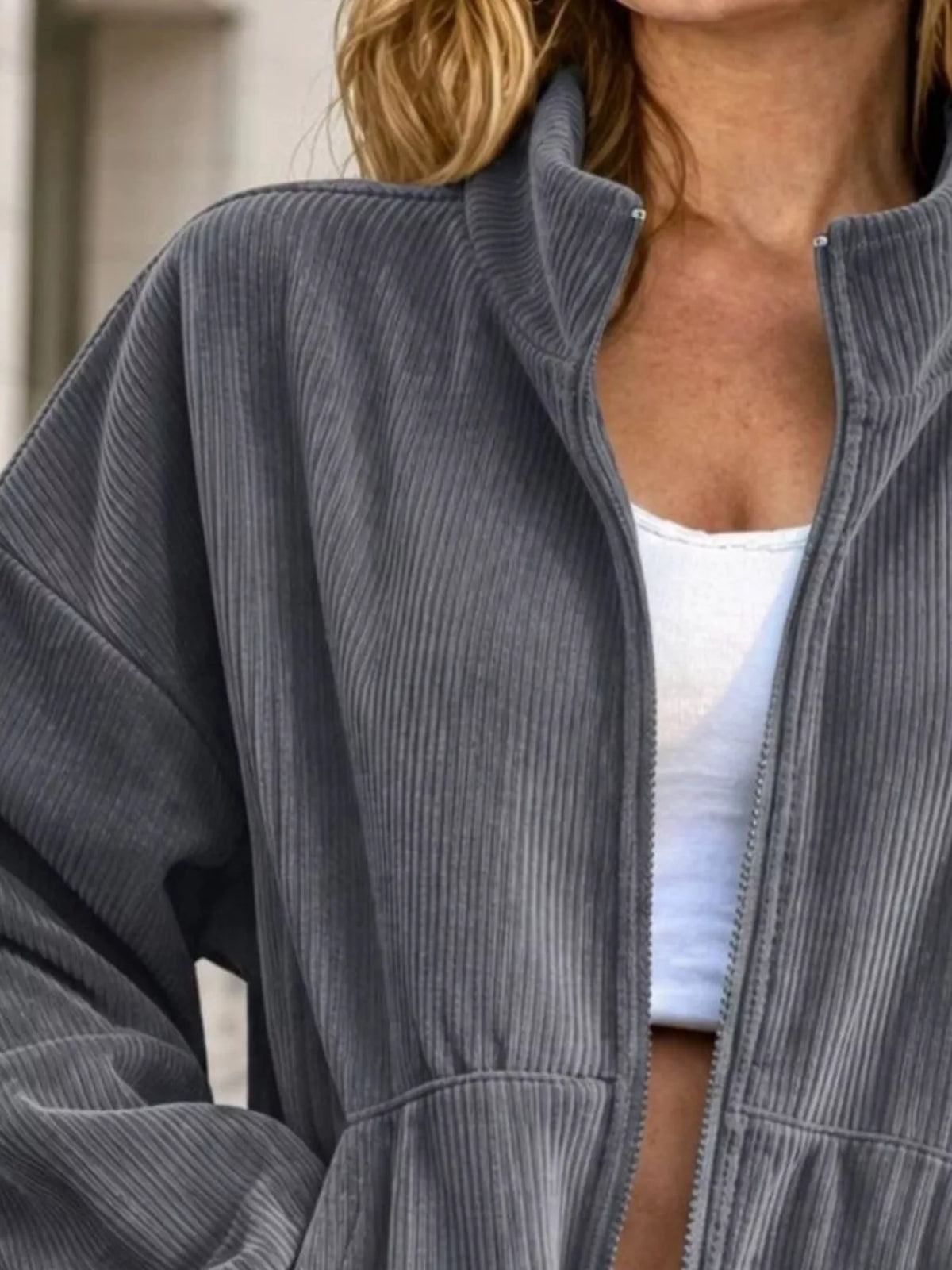 Gray corduroy zip-up jacket, collar and zipper detail
