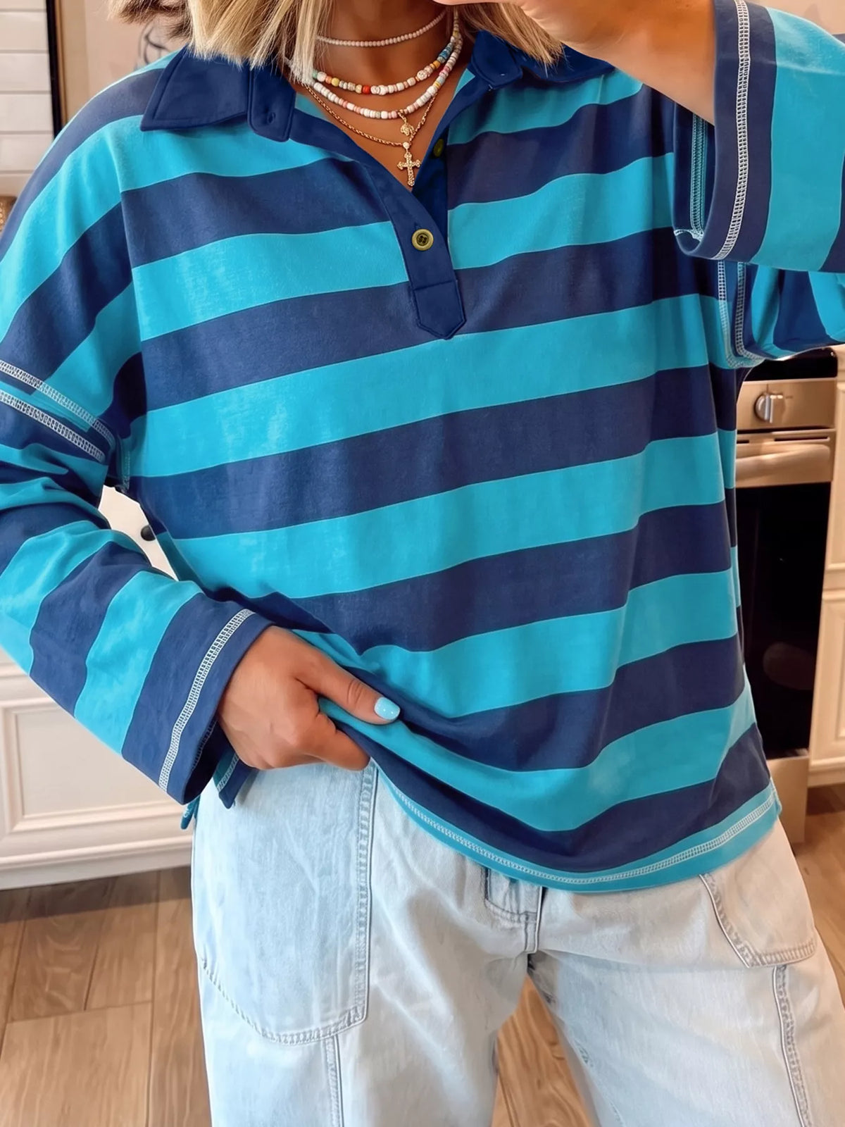 Striped polo top, blue striped polo front