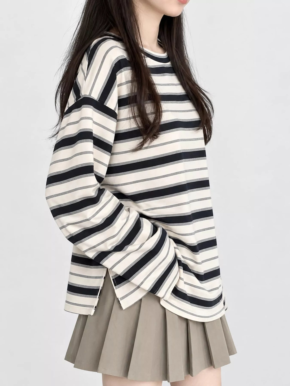 Cream and black striped oversized T-shirt, side view