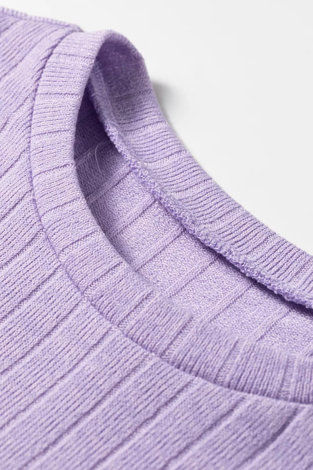 Purple ribbed long sleeve top, neckline detail