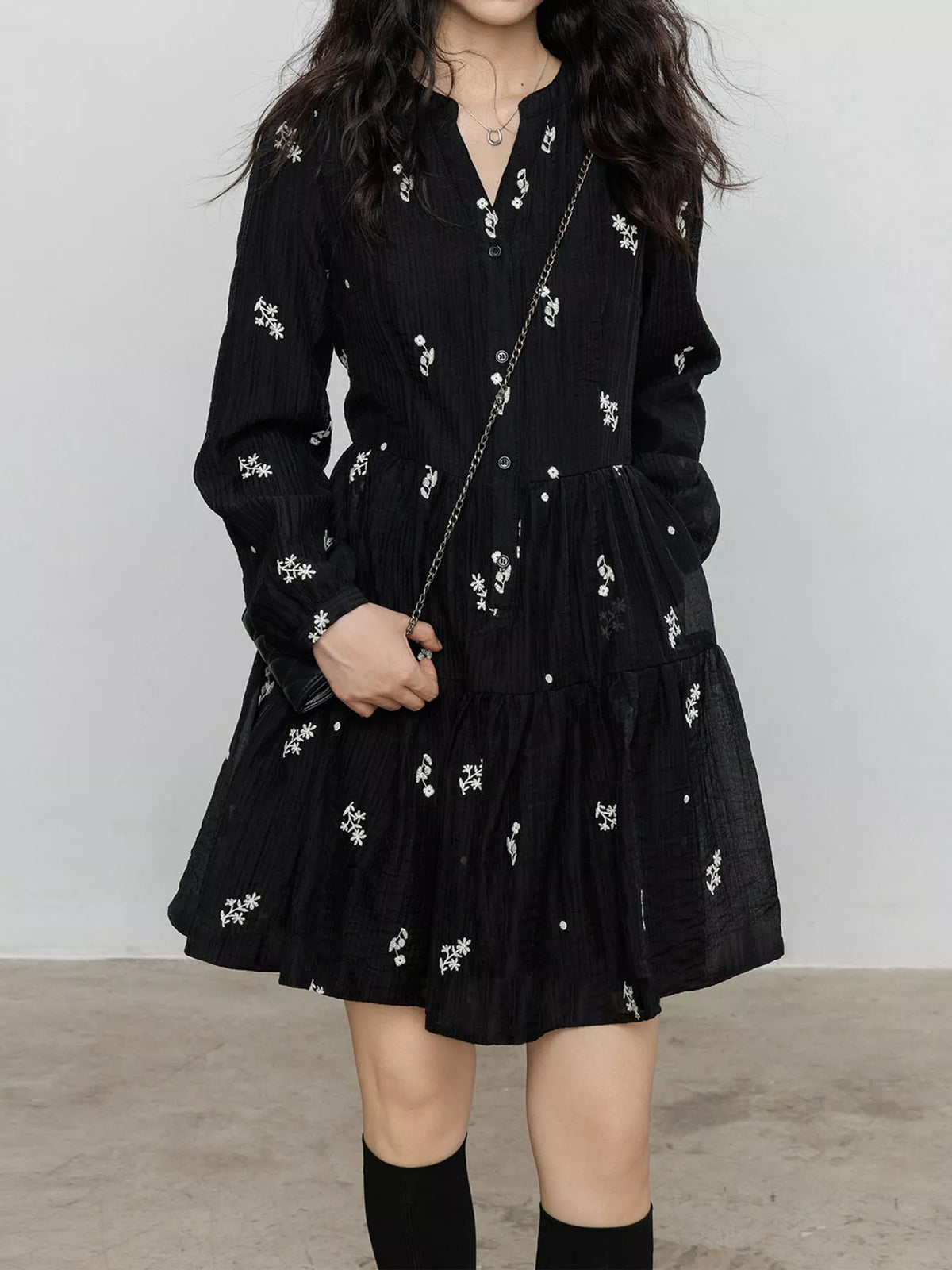 Women's Floral Long Sleeve Mini Dress in black floral — front view