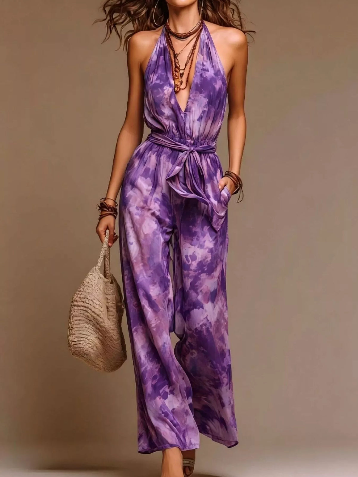 Purple tie-dye halter wide-leg jumpsuit, full front view.