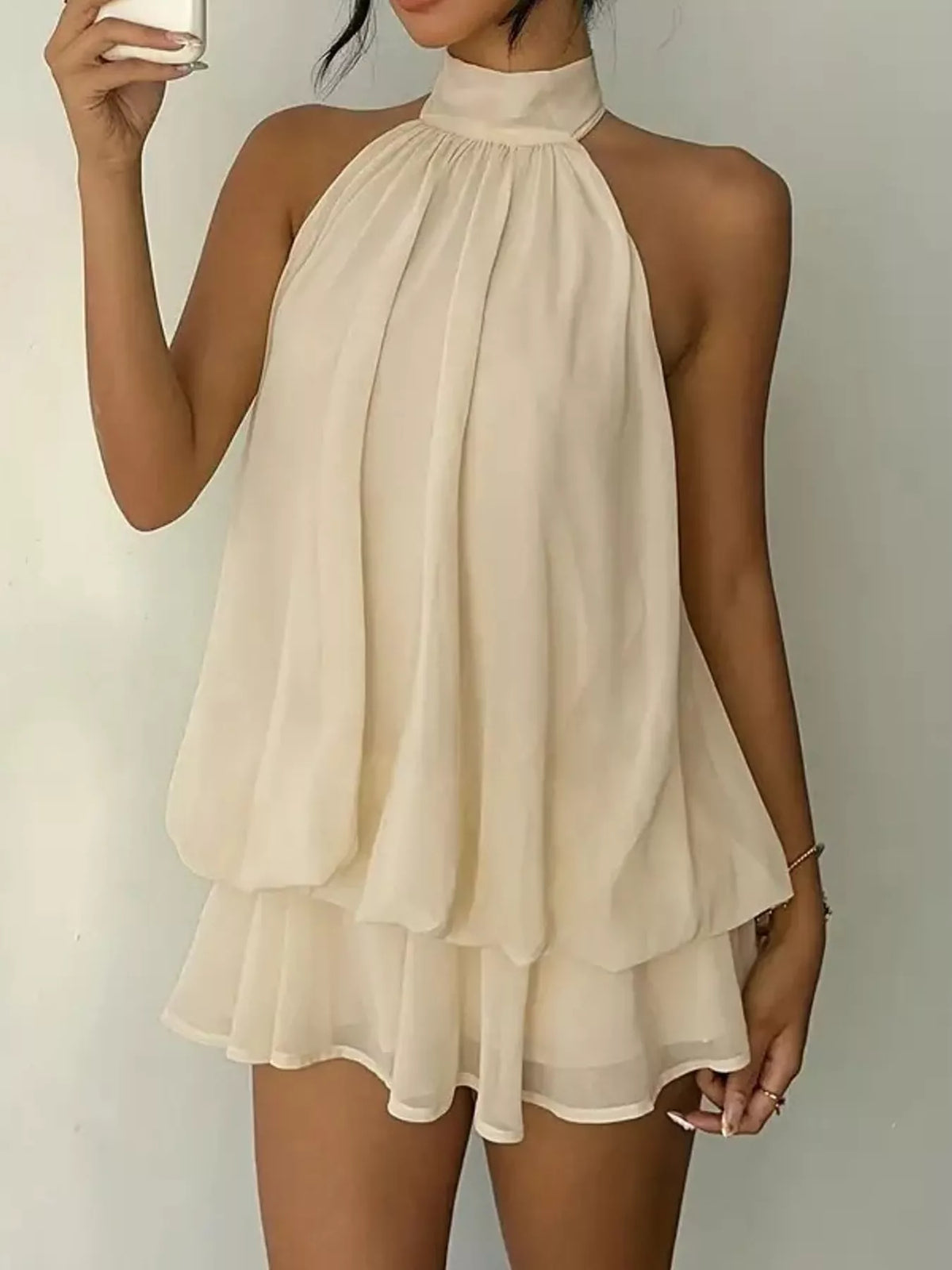 Cream halter neck layered mini dress, front styled view