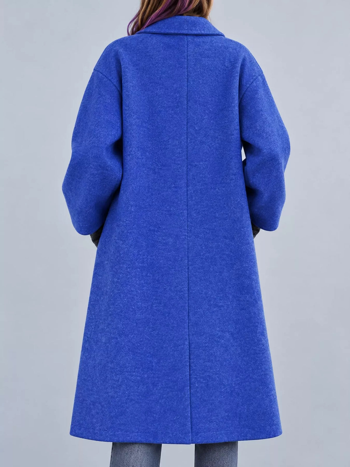 Blue lapel collar one button coat, back view