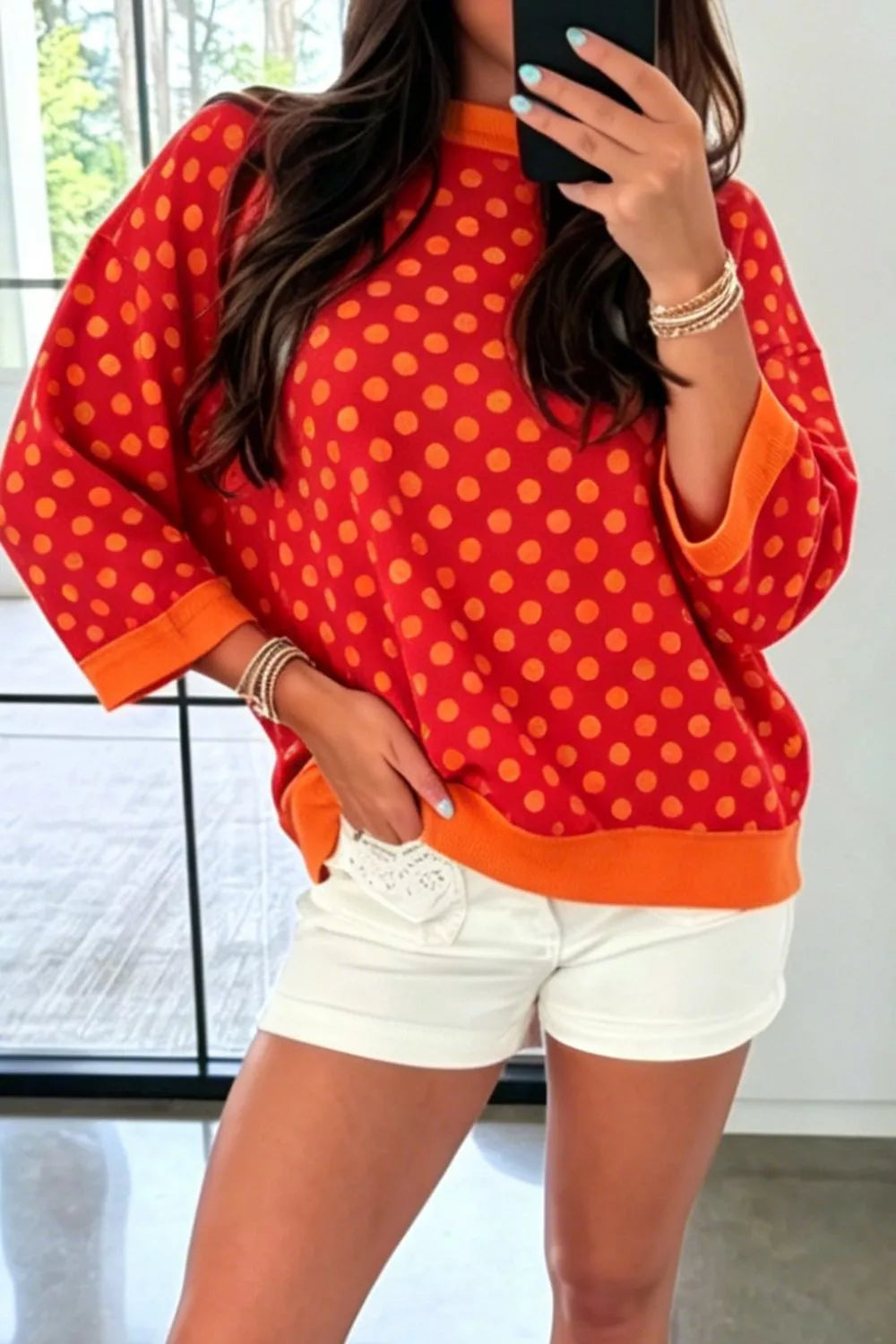 Polka Dot Sweatshirt in red with orange dots, front view