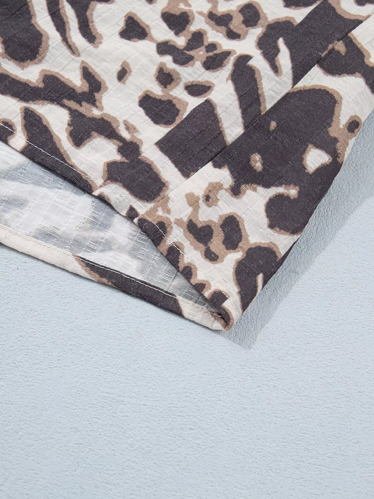 Leopard Print V Neck Button Down Balloon Sleeve Shirt in dark brown, construction detail