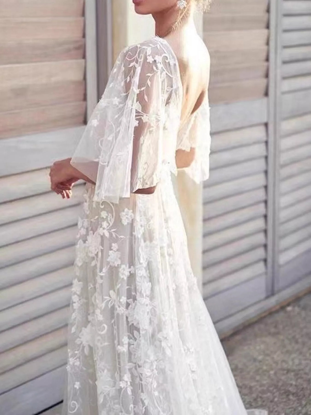 White lace v-neck maxi dress with flutter sleeves