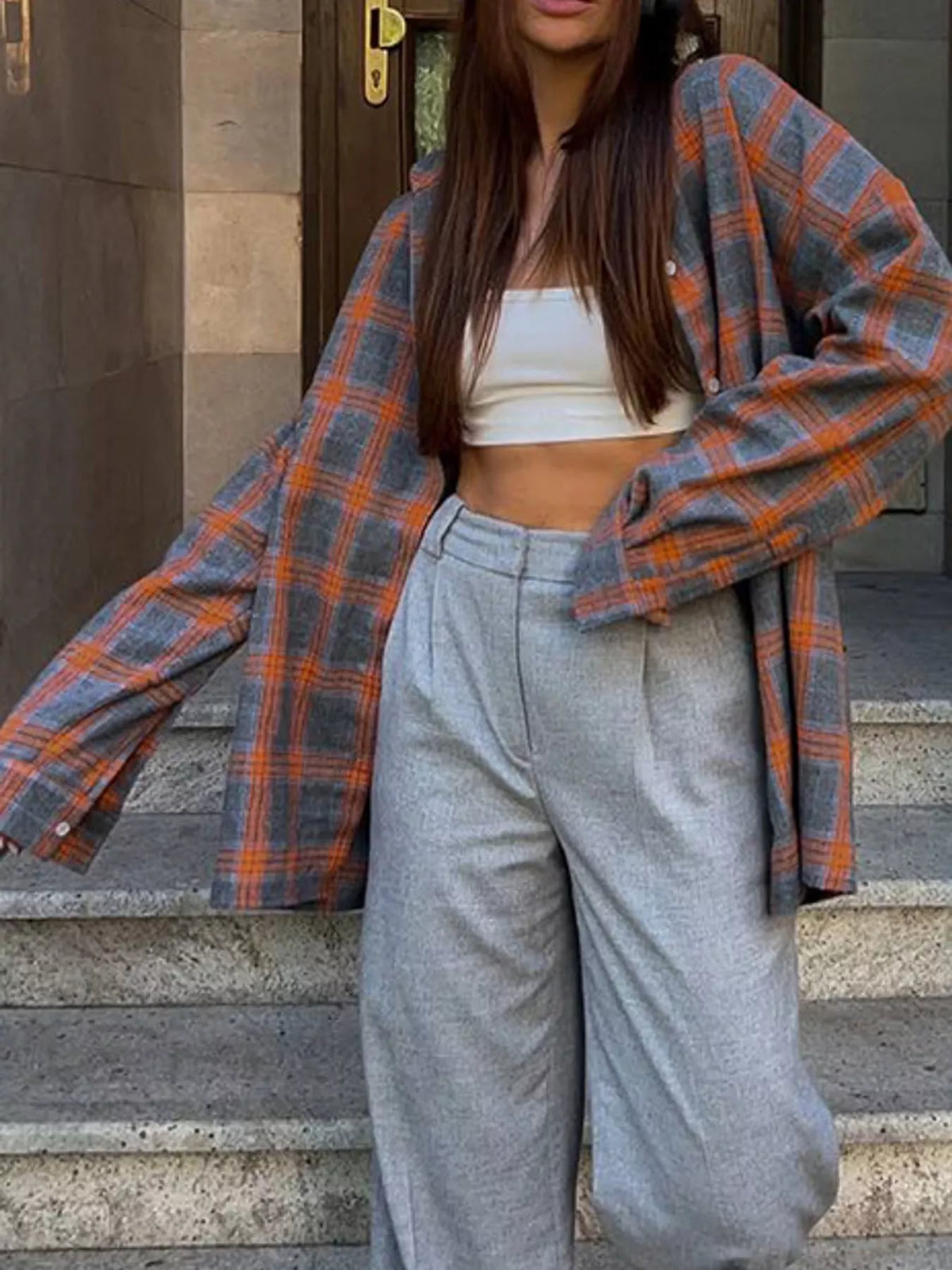 Orange and gray plaid button-up shirt with chest pockets