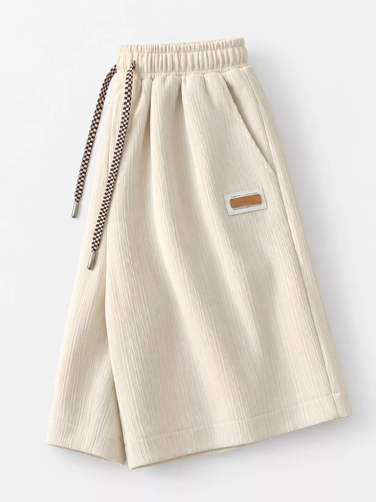 Women's Textured Drawstring Casual Shorts in cream — side flat lay view