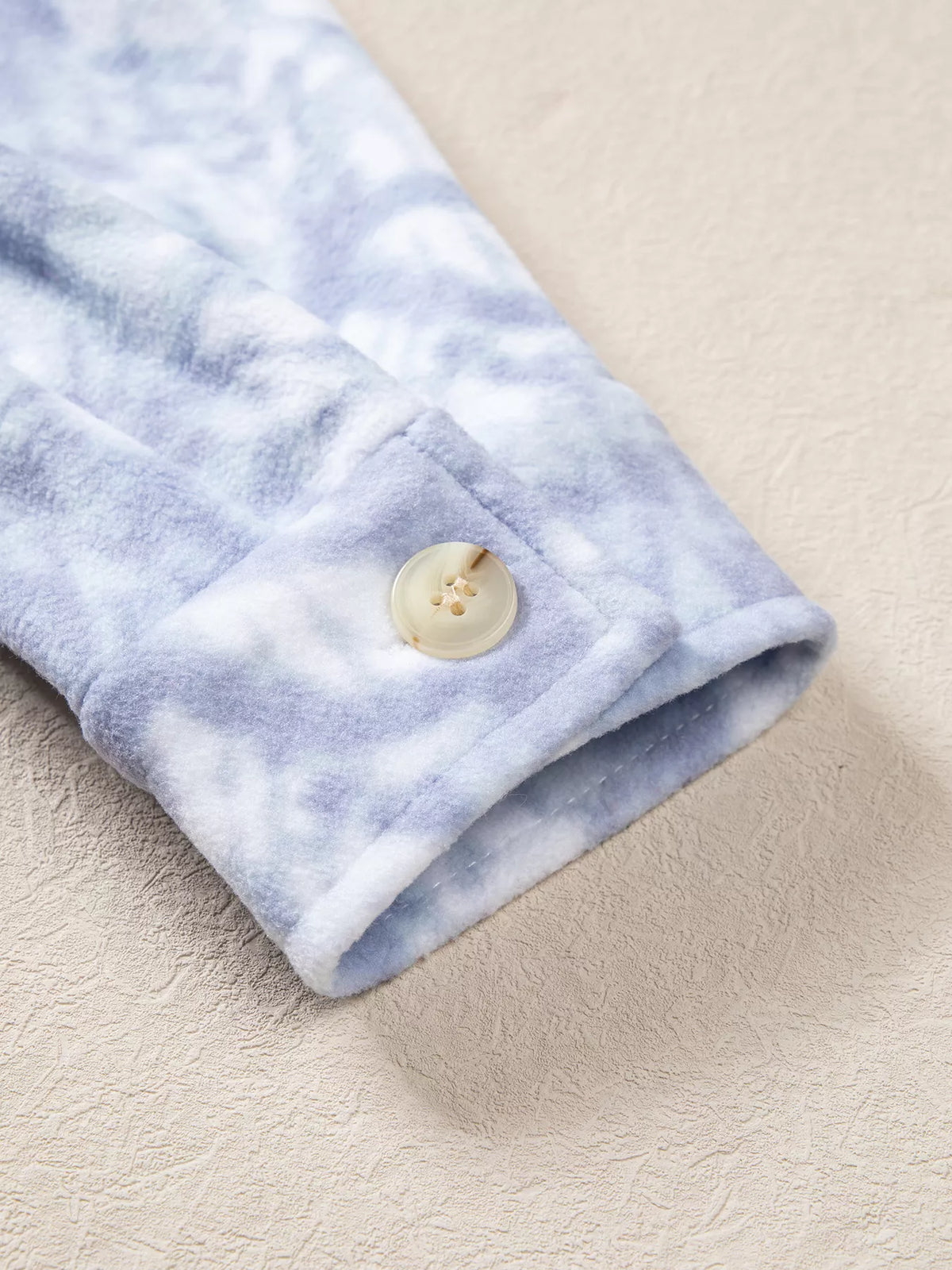 Button cuff on light blue abstract print fuzzy collar tunic jacket